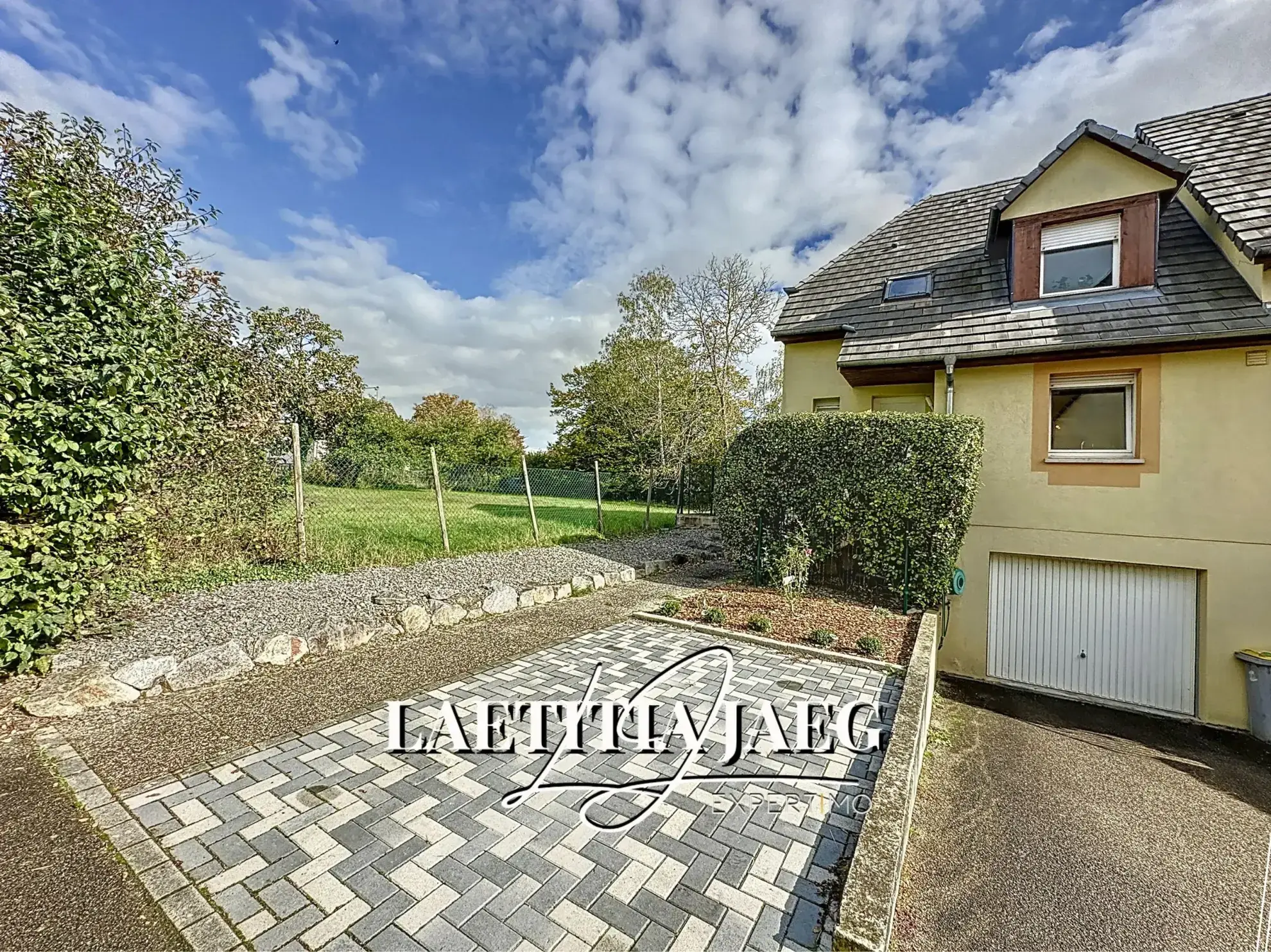 Maison familiale calme avec jardin et double garage à Huttenheim 