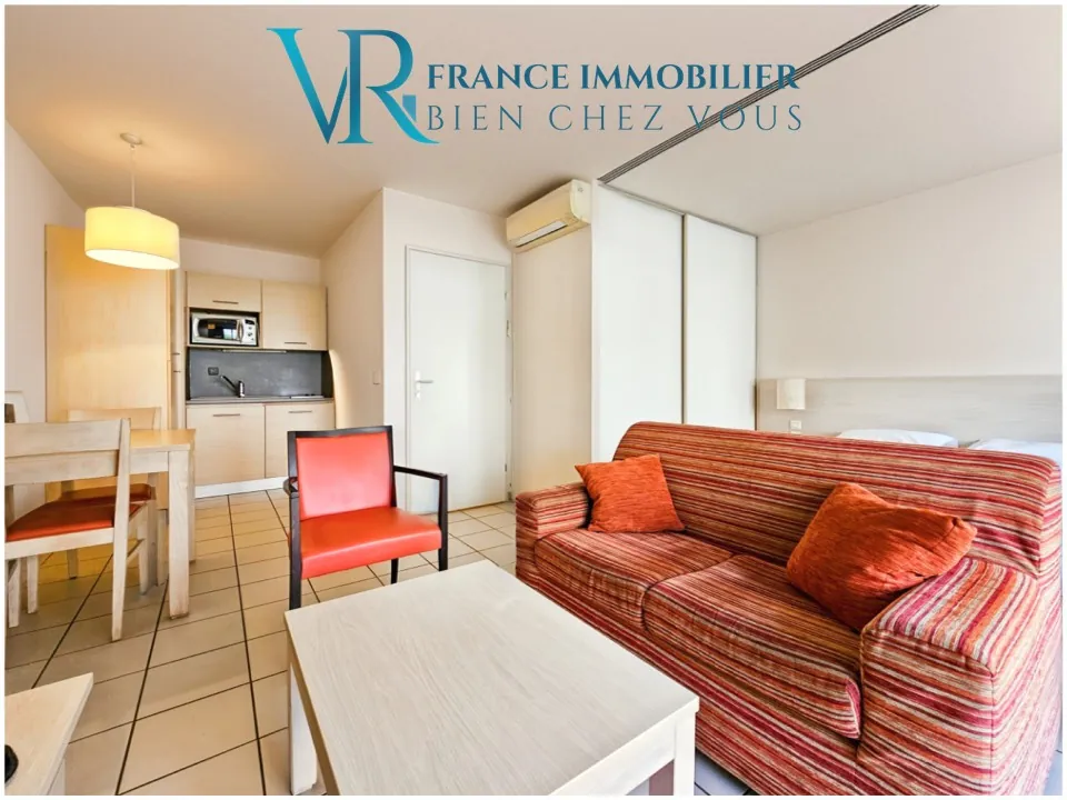 Investissez dans un studio meublé avec terrasse et parking à Divonne-les-Bains 