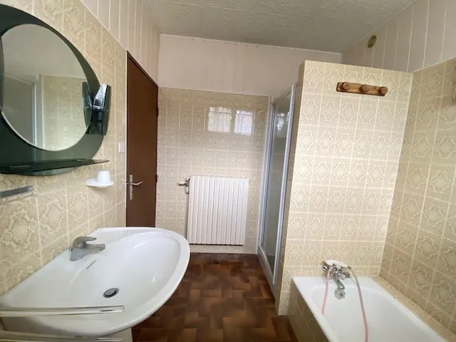 Maison familiale à Belfort de 87m² avec jardin et 3 chambres, à rénover 