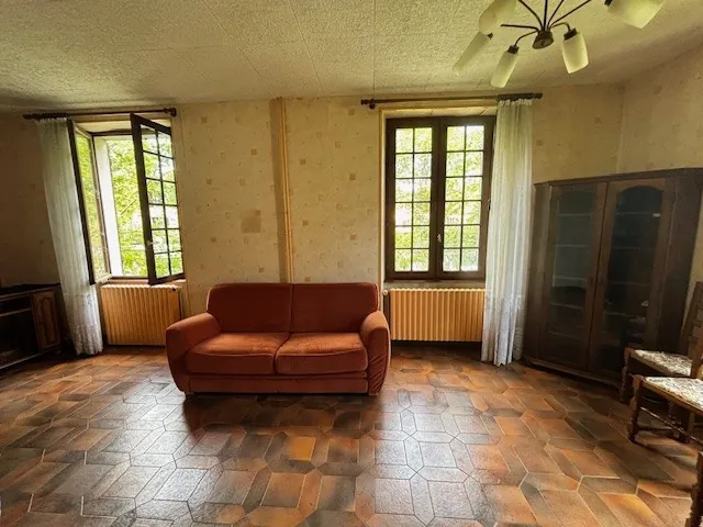 Maison familiale à Belfort de 87m² avec jardin et 3 chambres, à rénover 