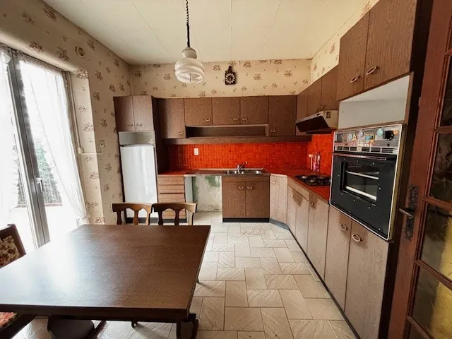 Maison familiale à Belfort de 87m² avec jardin et 3 chambres, à rénover 