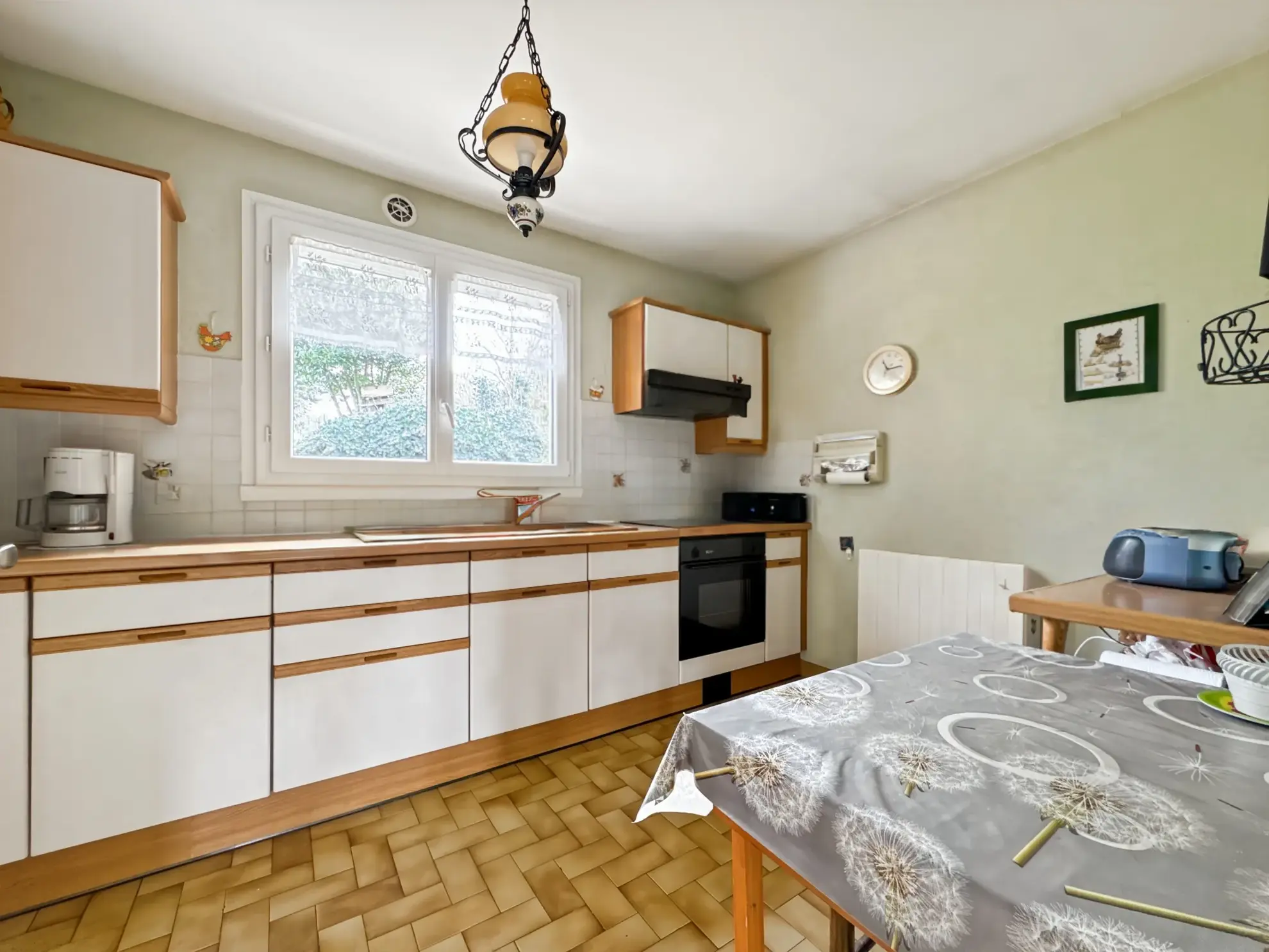 Maison de plain-pied à Massieux avec jardin, proche commerces 