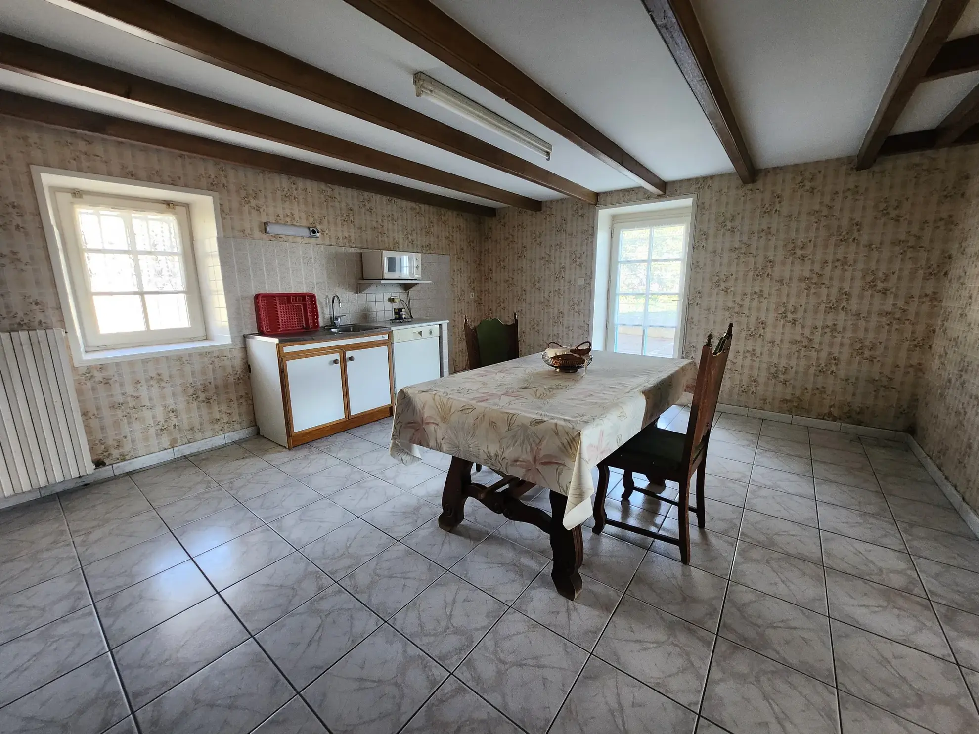 Ensemble immobilier avec deux maisons à Nalliers, piscine et garage près de La Rochelle 