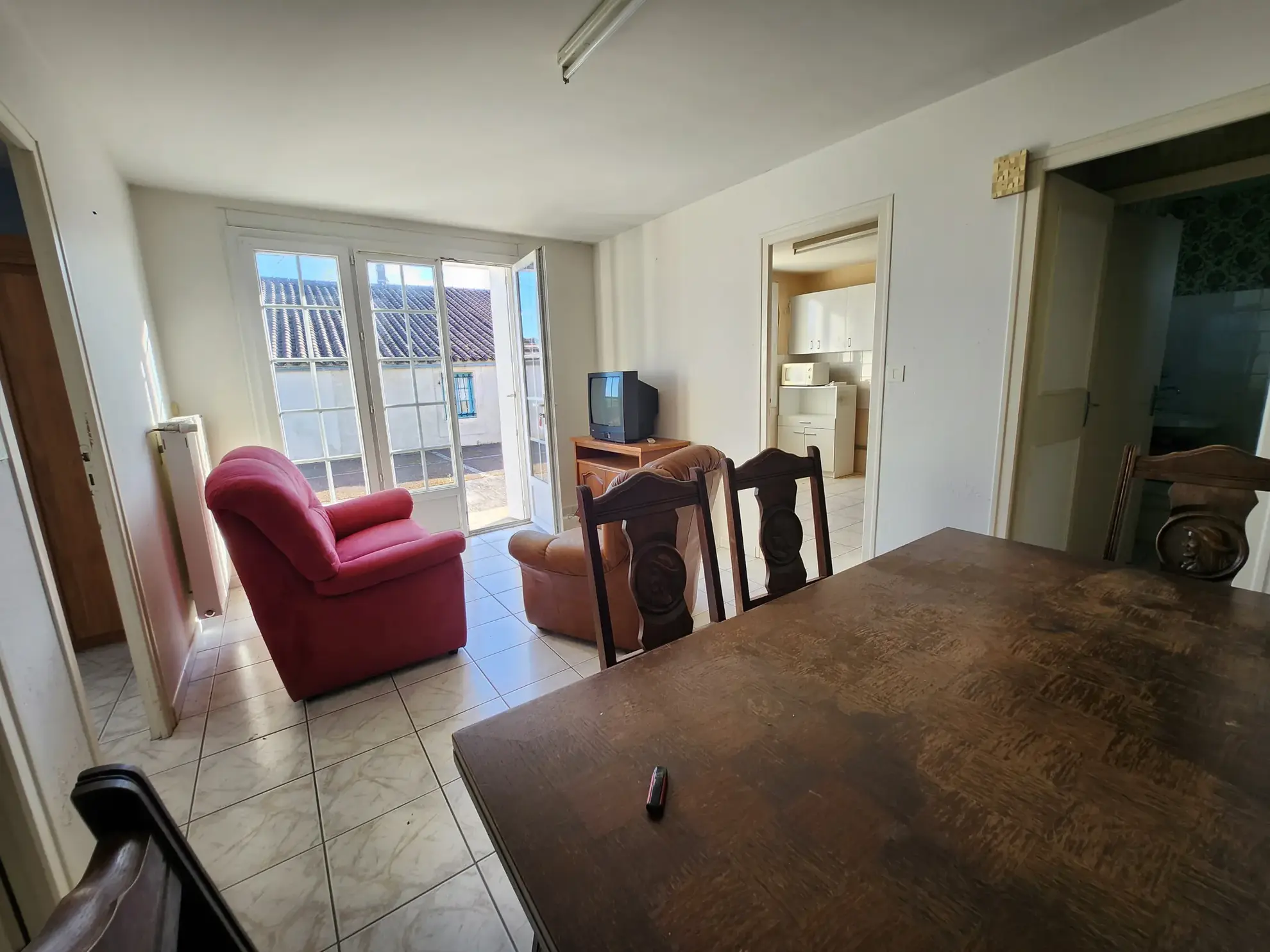 Ensemble immobilier avec deux maisons à Nalliers, piscine et garage près de La Rochelle 