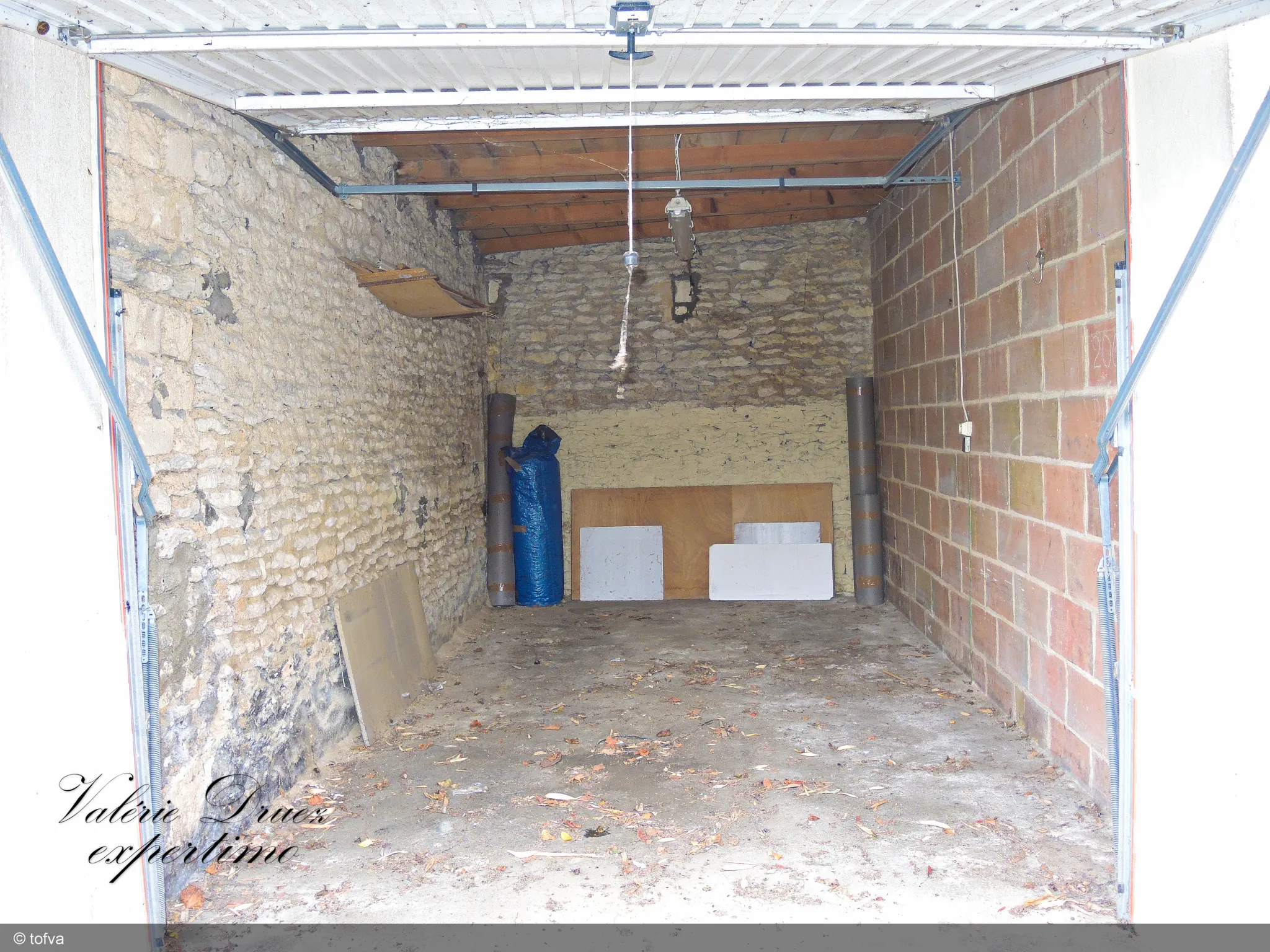 Maison de ville avec jardin et garage à Cognac Saint Martin 