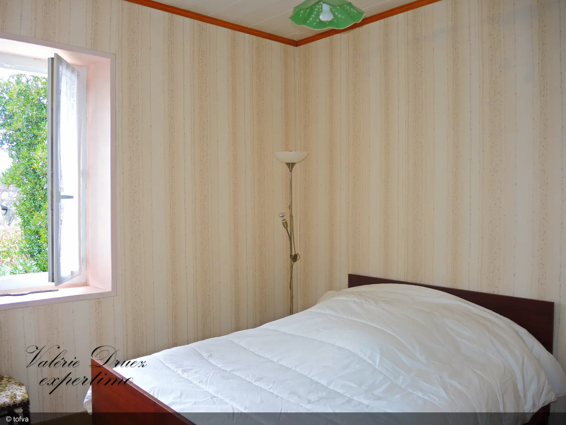 Maison de ville avec jardin et garage à Cognac Saint Martin 