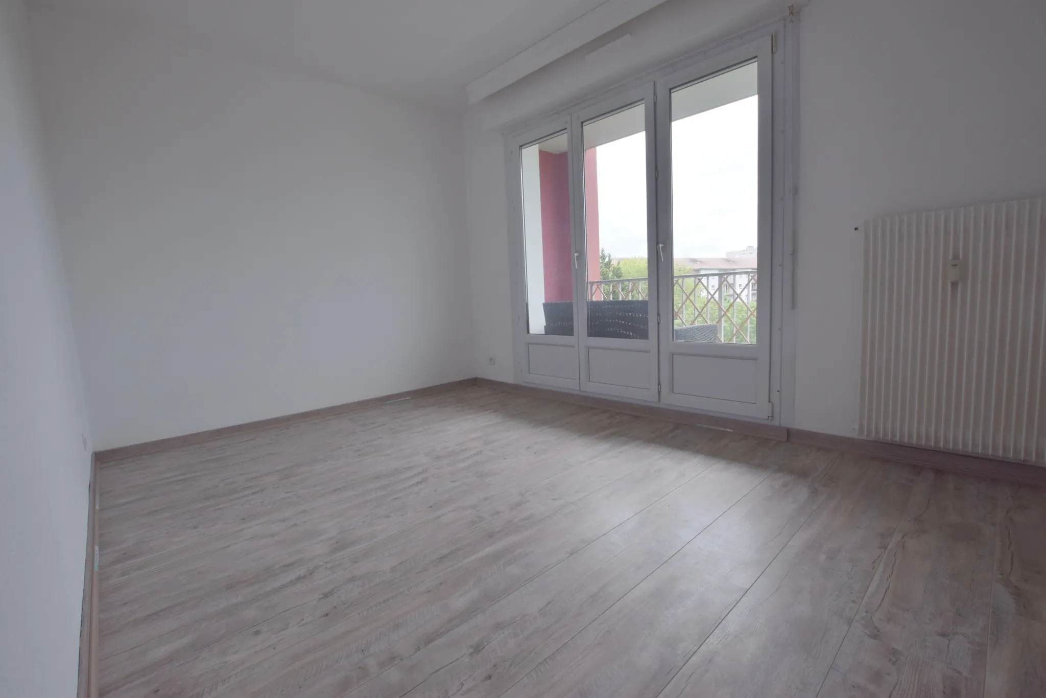 Appartement lumineux avec balcon, garage et cave à Sochaux 