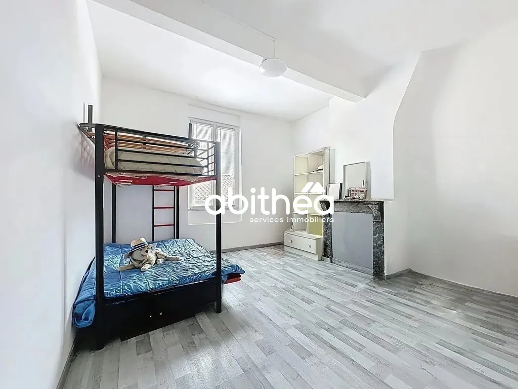 Appartement T2/T3 avec combles et terrasse à Béziers – Opportunité d'investissement 