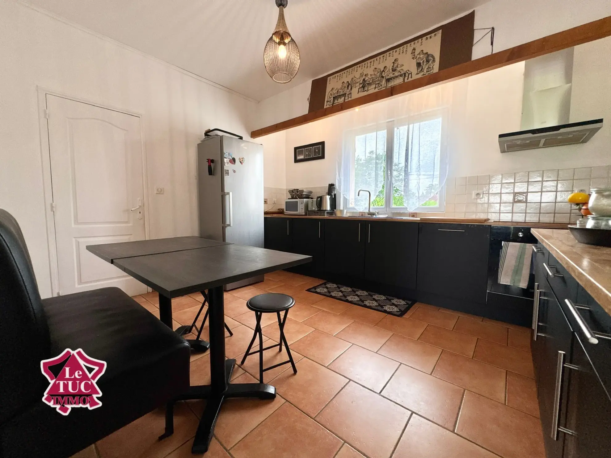 Maison familiale 4 chambres avec garage et jardin à Ledat 