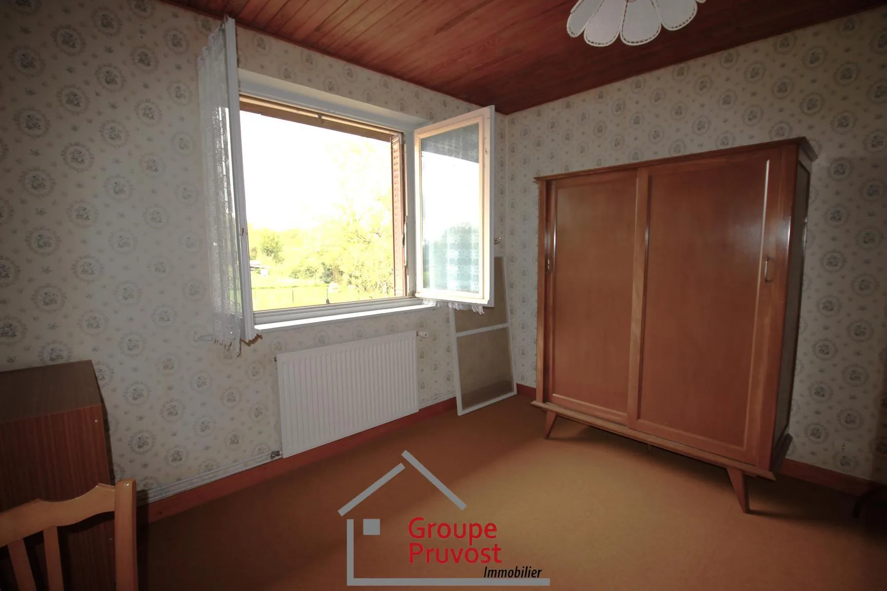 Maison familiale avec grand terrain à Saint Etienne sur Reyssouze 