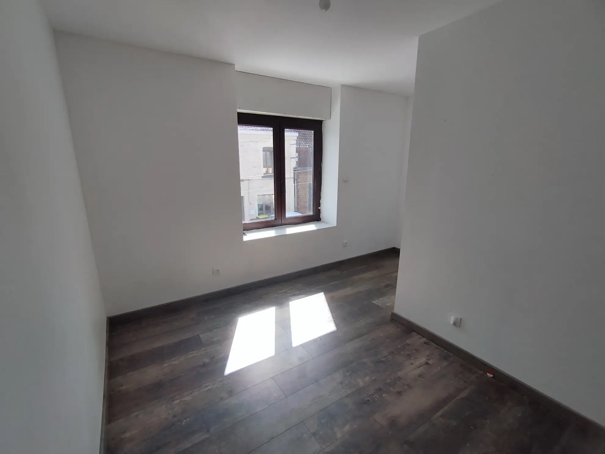 Maison mitoyenne à Annezin en plein centre-ville - 89 m² avec cour 