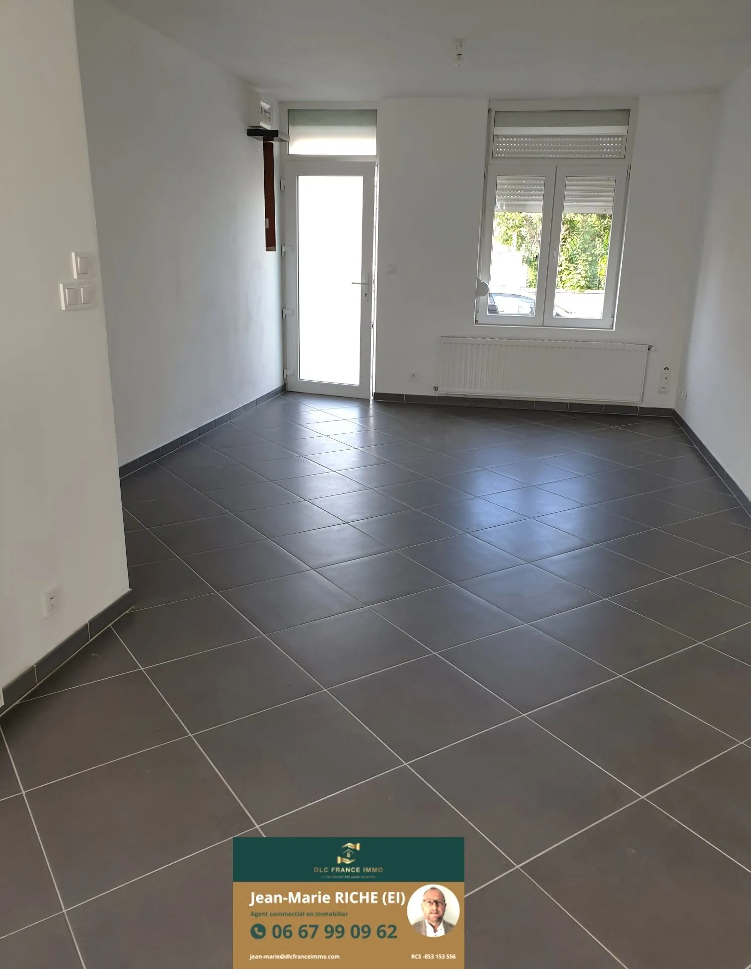 Maison semi-individuelle à vendre à Aulnoye-Aymeries avec garage et jardin clos 