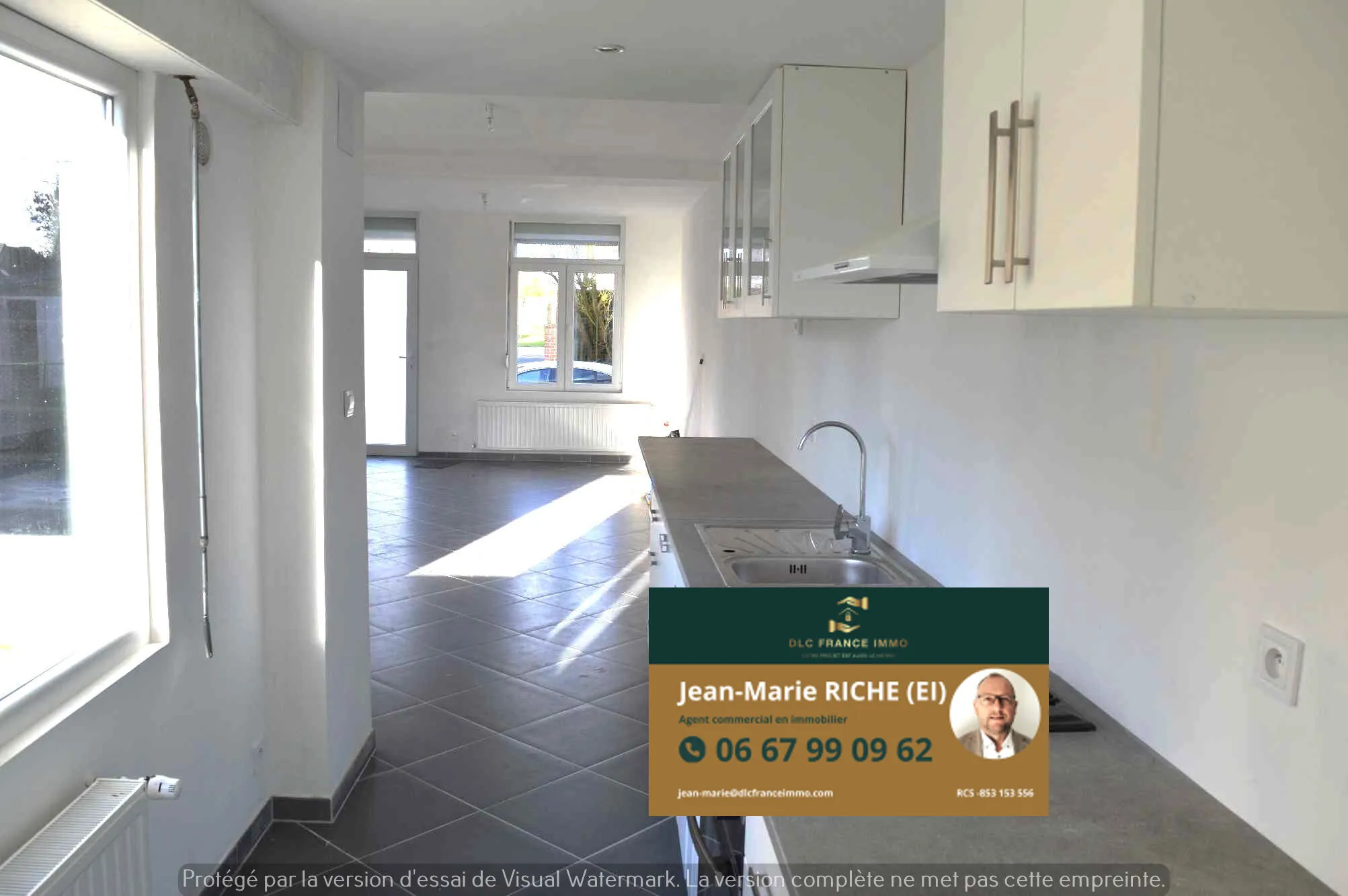 Maison semi-individuelle à vendre à Aulnoye-Aymeries avec garage et jardin clos 