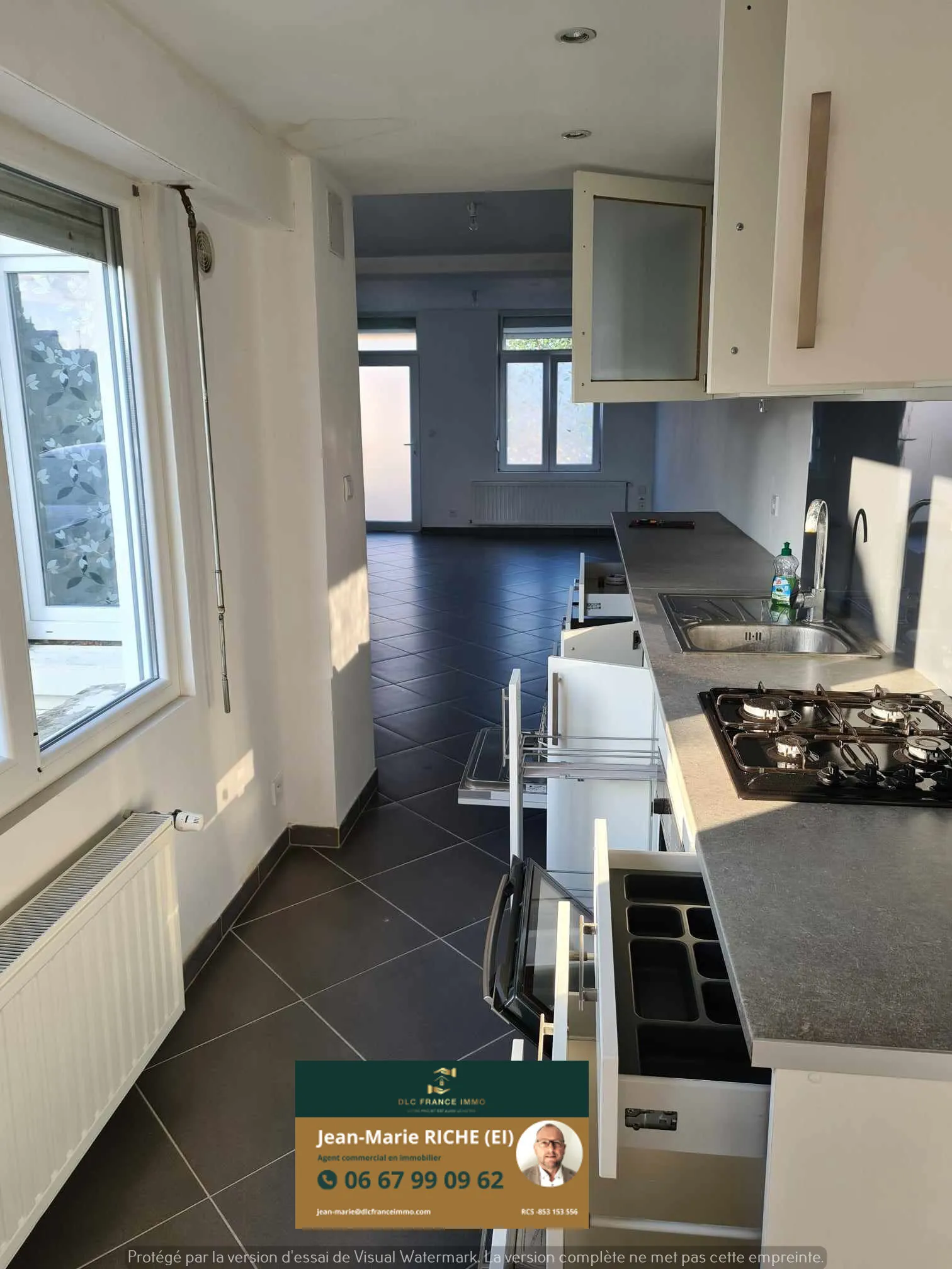 Maison semi-individuelle à vendre à Aulnoye-Aymeries avec garage et jardin clos 