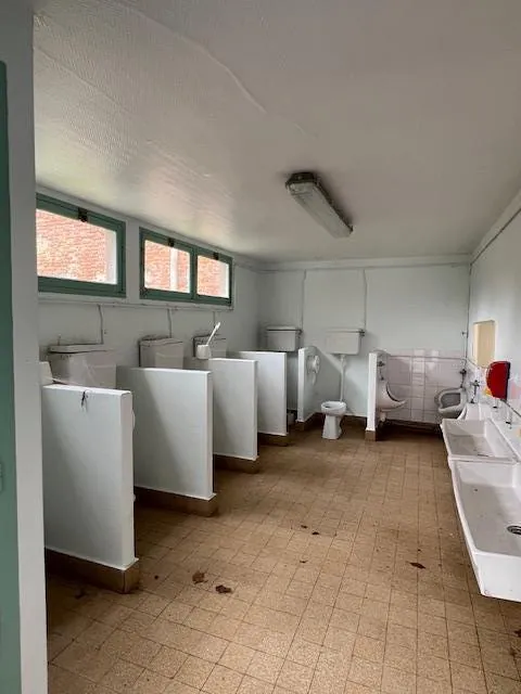 Immeuble ancien à rénover à Abbeville avec grande parcelle et potentiel de développement 