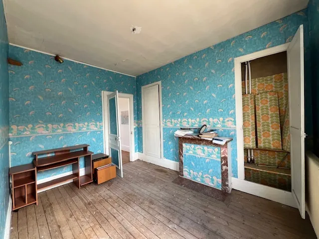 Immeuble ancien à rénover à Abbeville avec grande parcelle et potentiel de développement 