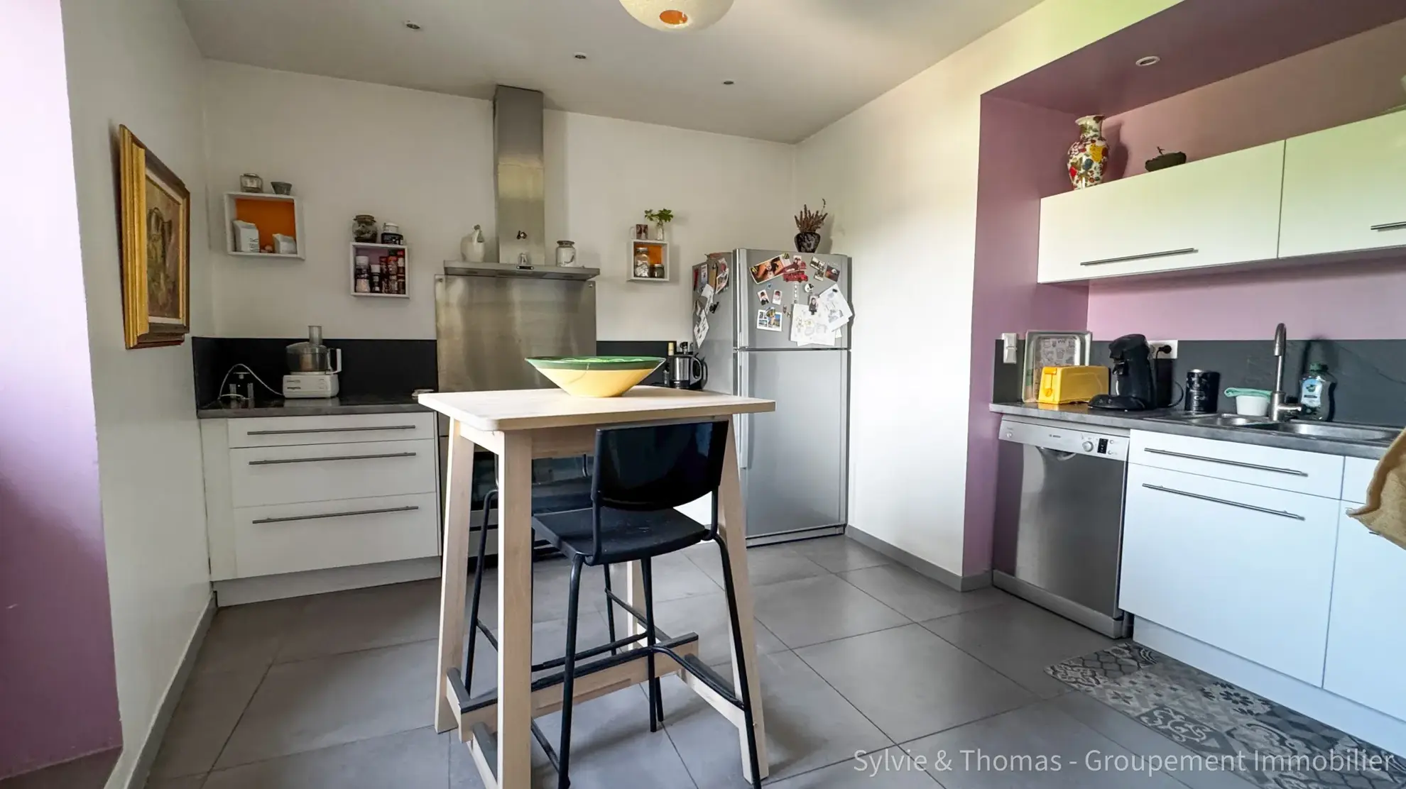 Triplex lumineux de 130 m2 à Pont-Saint-Esprit avec parking et cave 