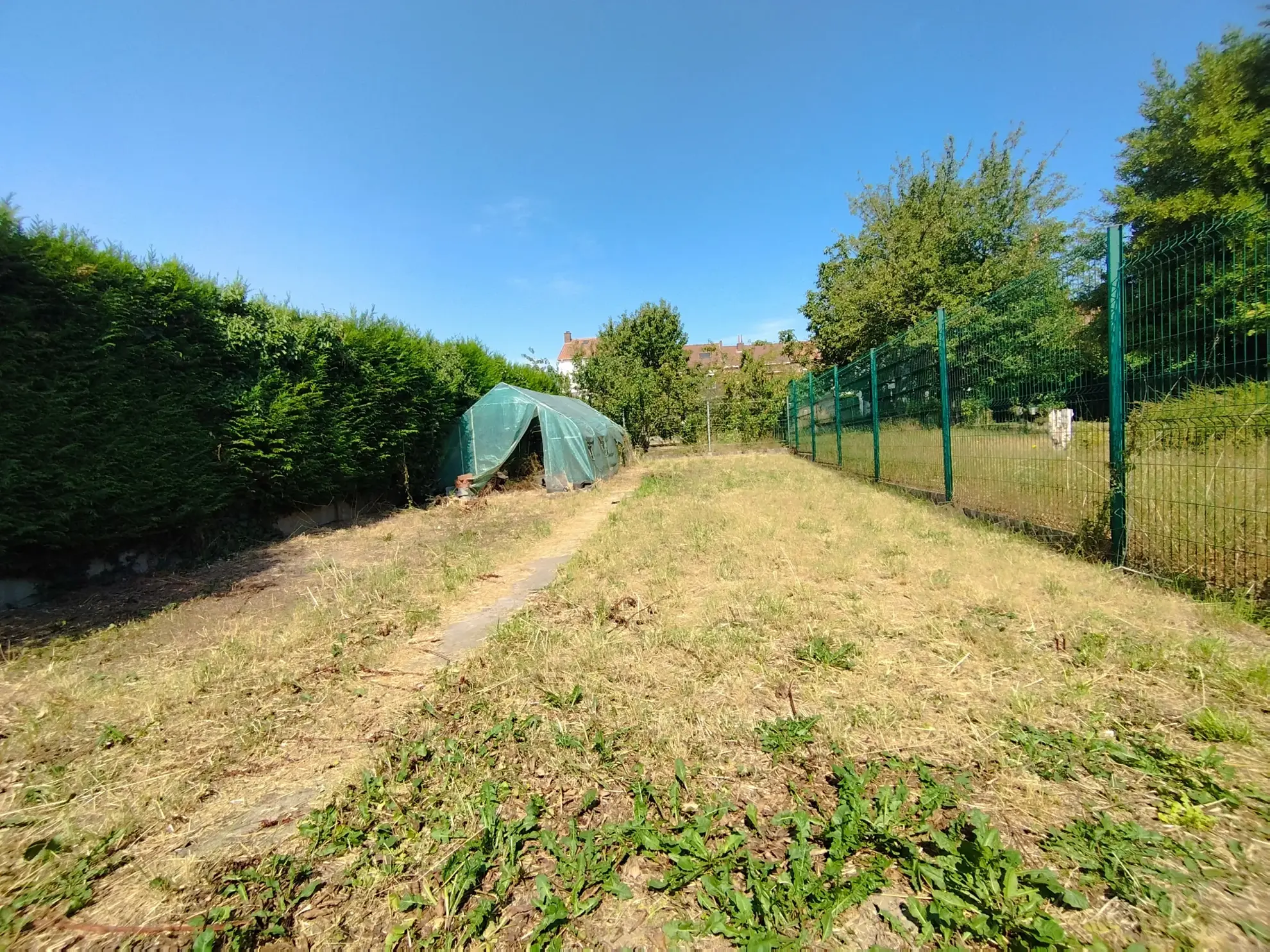 Maison plain-pied individuelle à Harnes avec 3 chambres et garage 