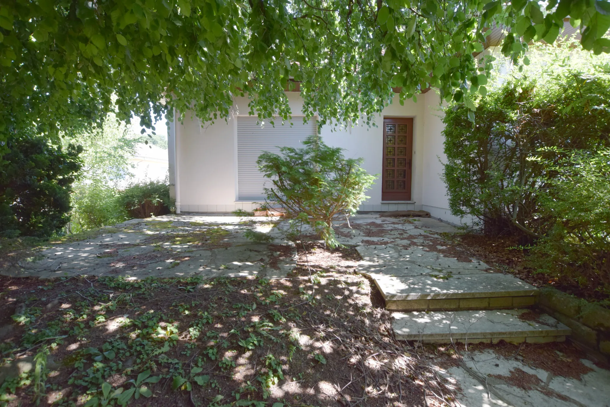 Maison lumineuse et fonctionnelle avec jardin à Grand-Charmont