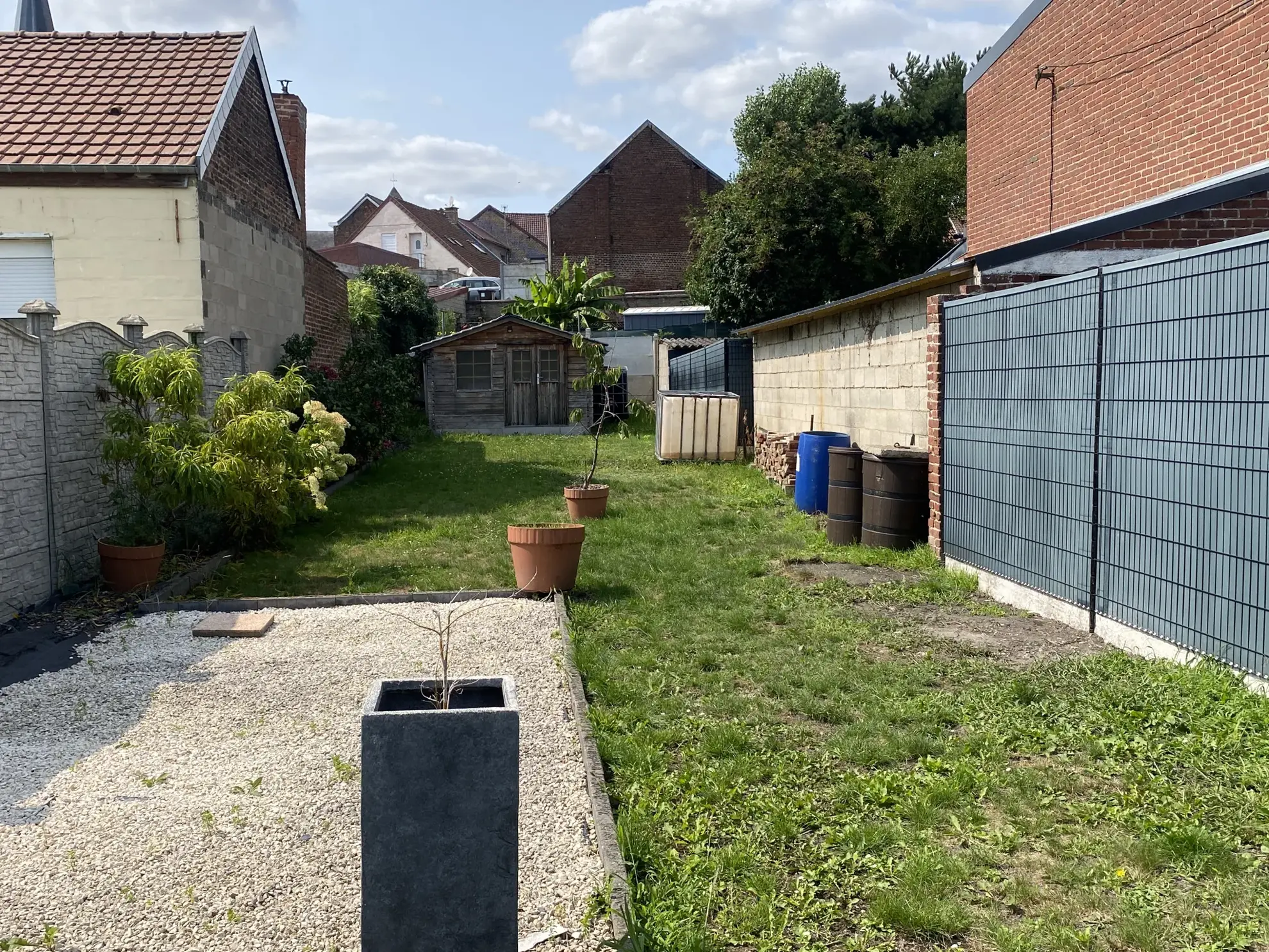 Maison de 116m² avec 3 chambres, jardin et parking à Trith Saint Léger 