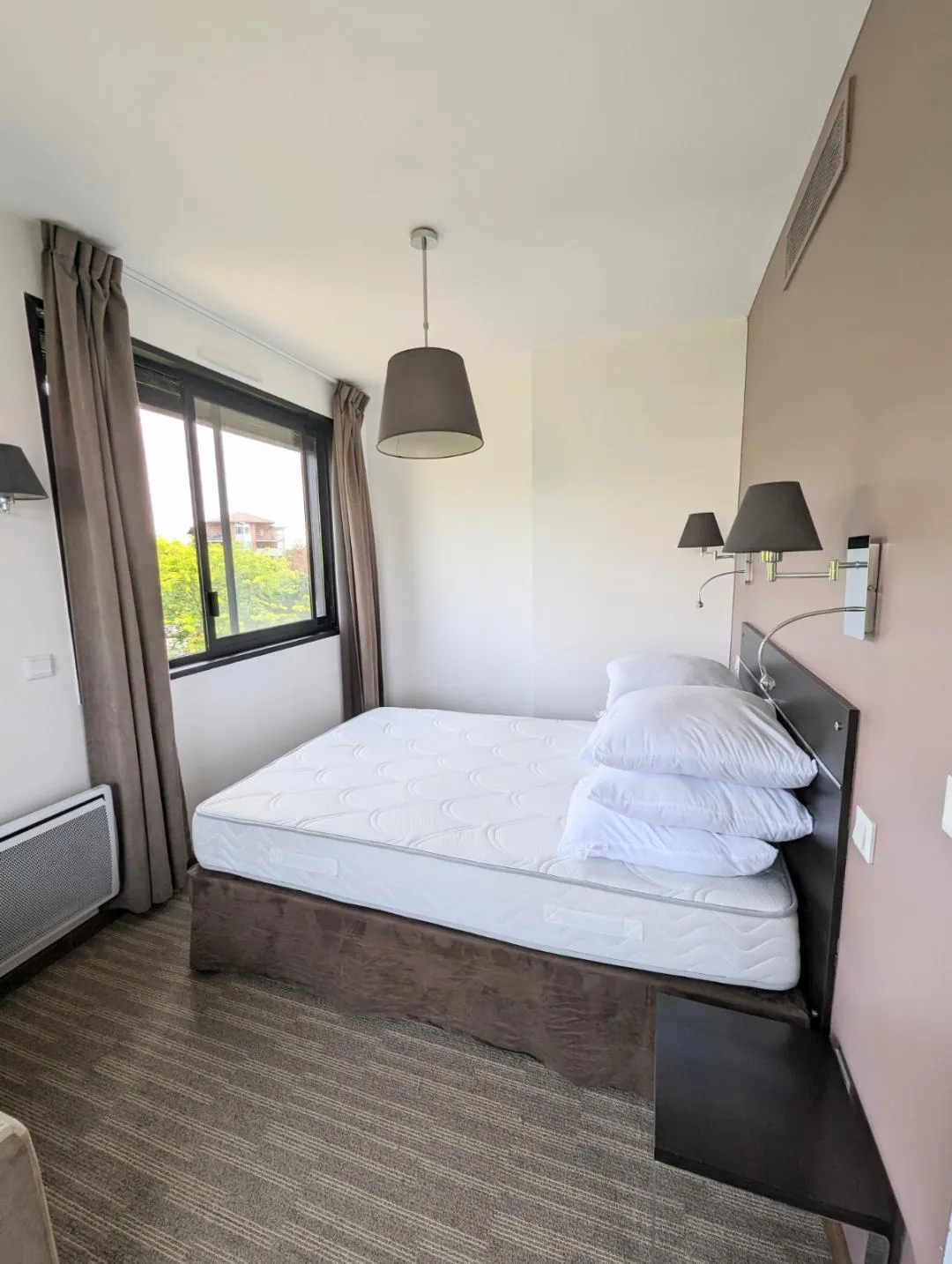 Investissement appartement T2 à Ferney avec parking et locataire en place