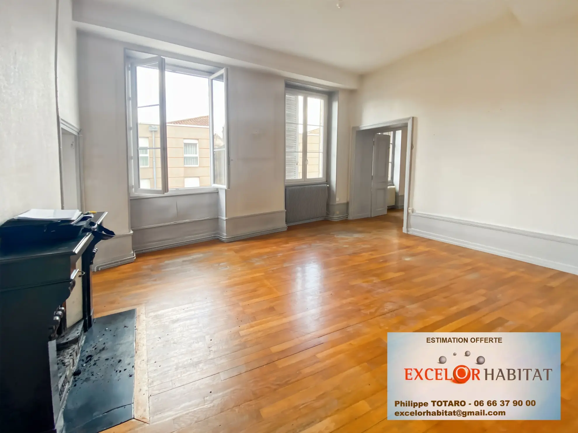 Appartement spacieux de 120 m² en hypercentre de Mâcon avec cachet et potentiel d’aménagement 