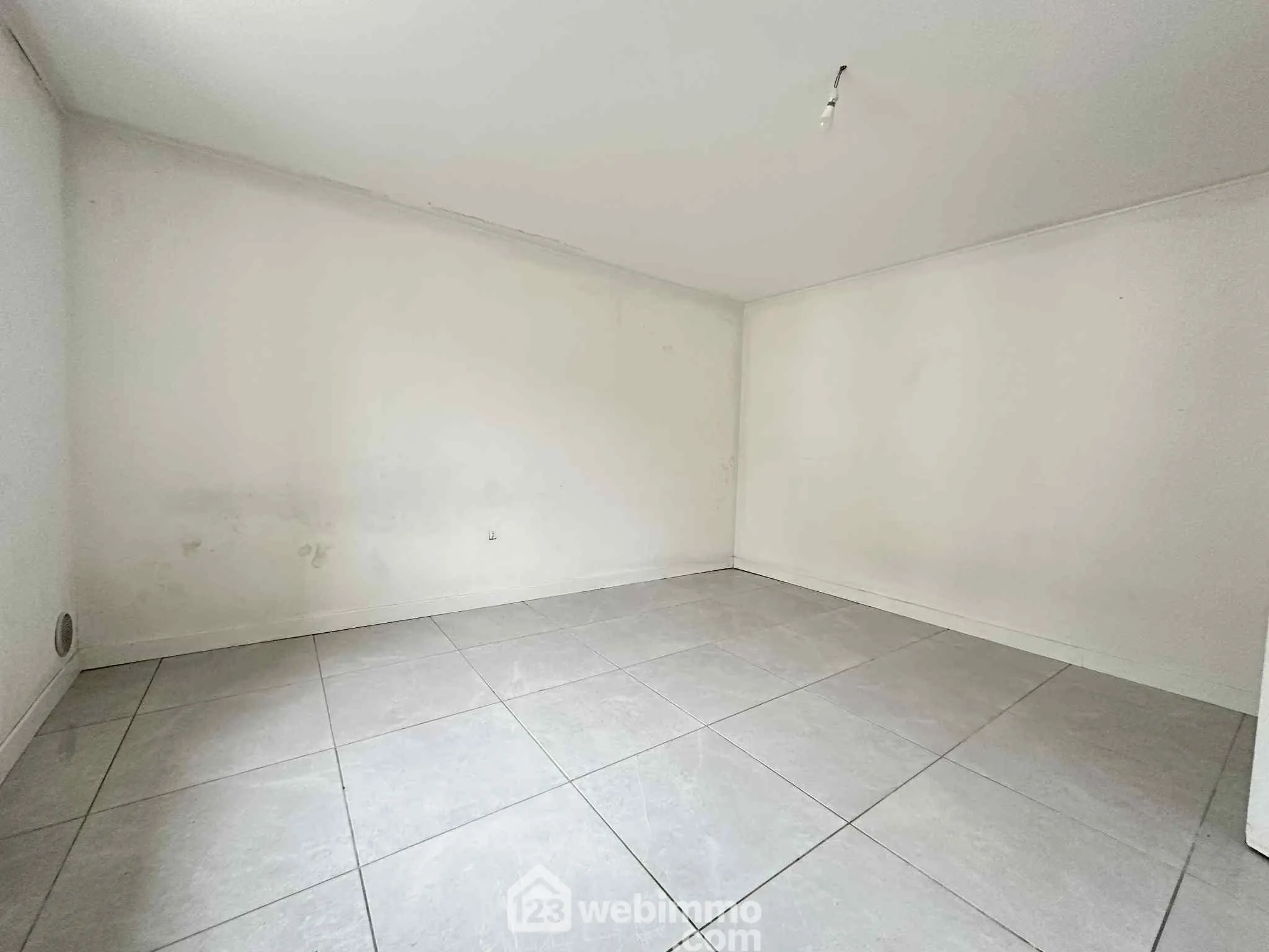 Charmante maison de ville de 85 m² à Sissonne avec jardin et garage 