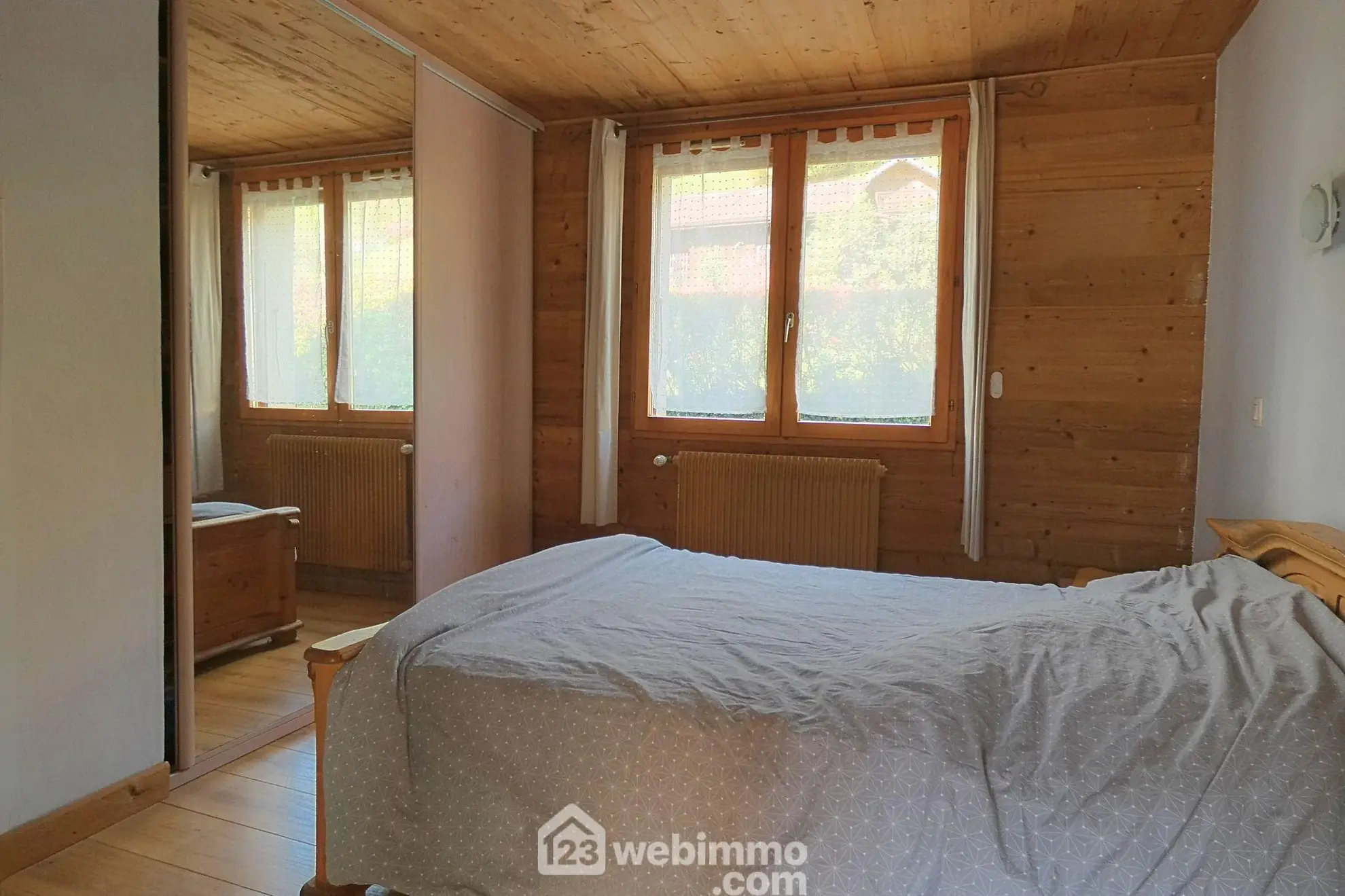 Appartement T4 en rez de jardin avec jardin privé à Marthod 