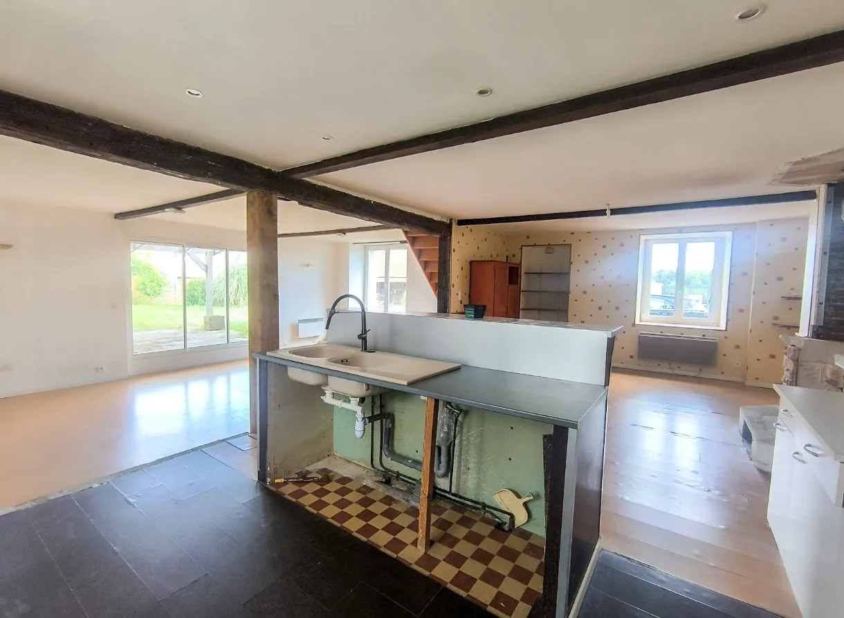 Maison en pierre à vendre à Chézy-sur-Marne avec potentiel et grand jardin 