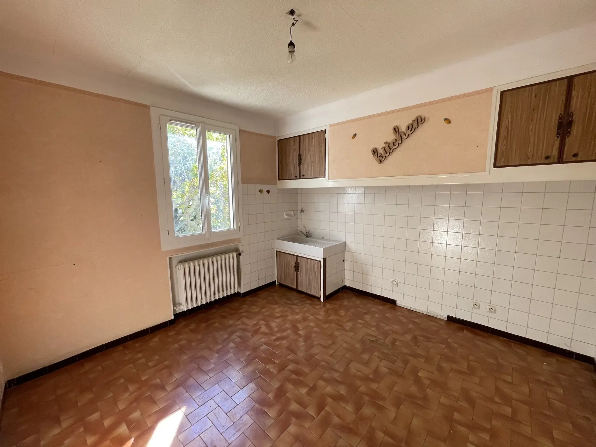 Haut de villa de 72 m² avec jardin et garage à Marseille 