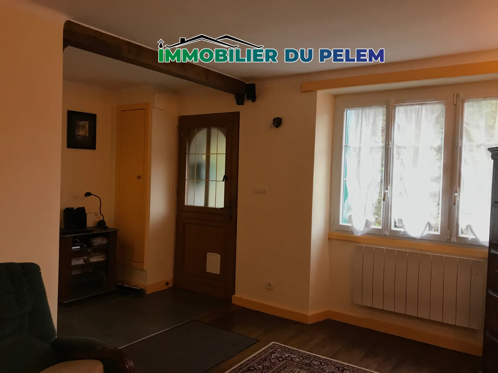 A vendre maison de ville à Saint-Nicolas du Pélem - 65m², deux chambres, charme et confort 