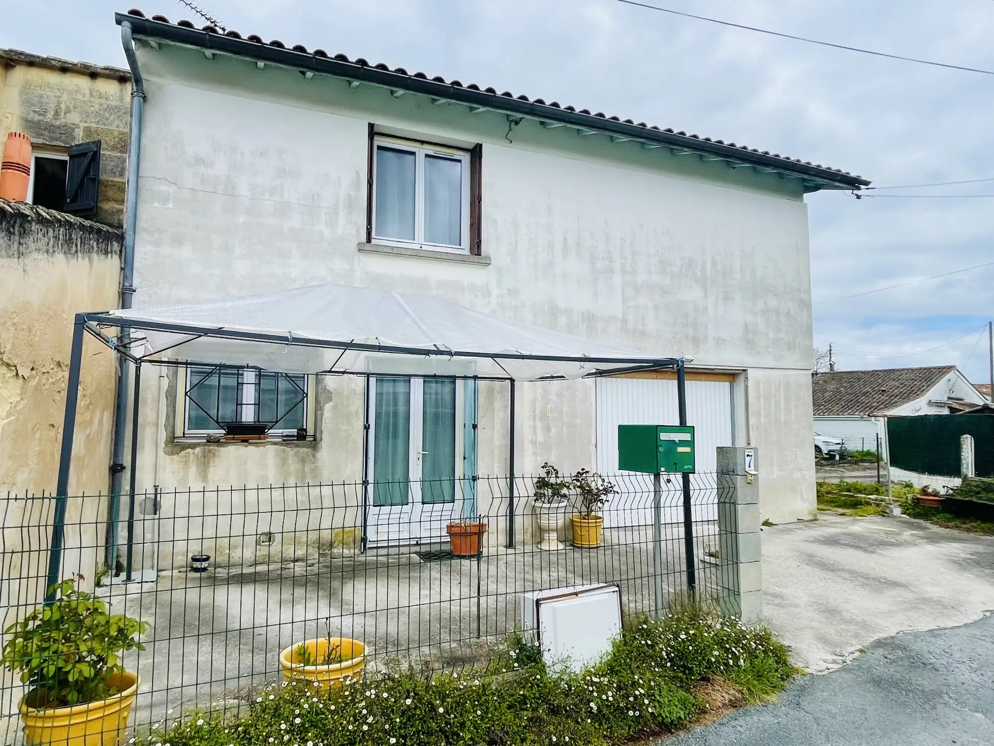 Maison à vendre à Libourne de 105m2 avec 3 chambres, garage et jardin 