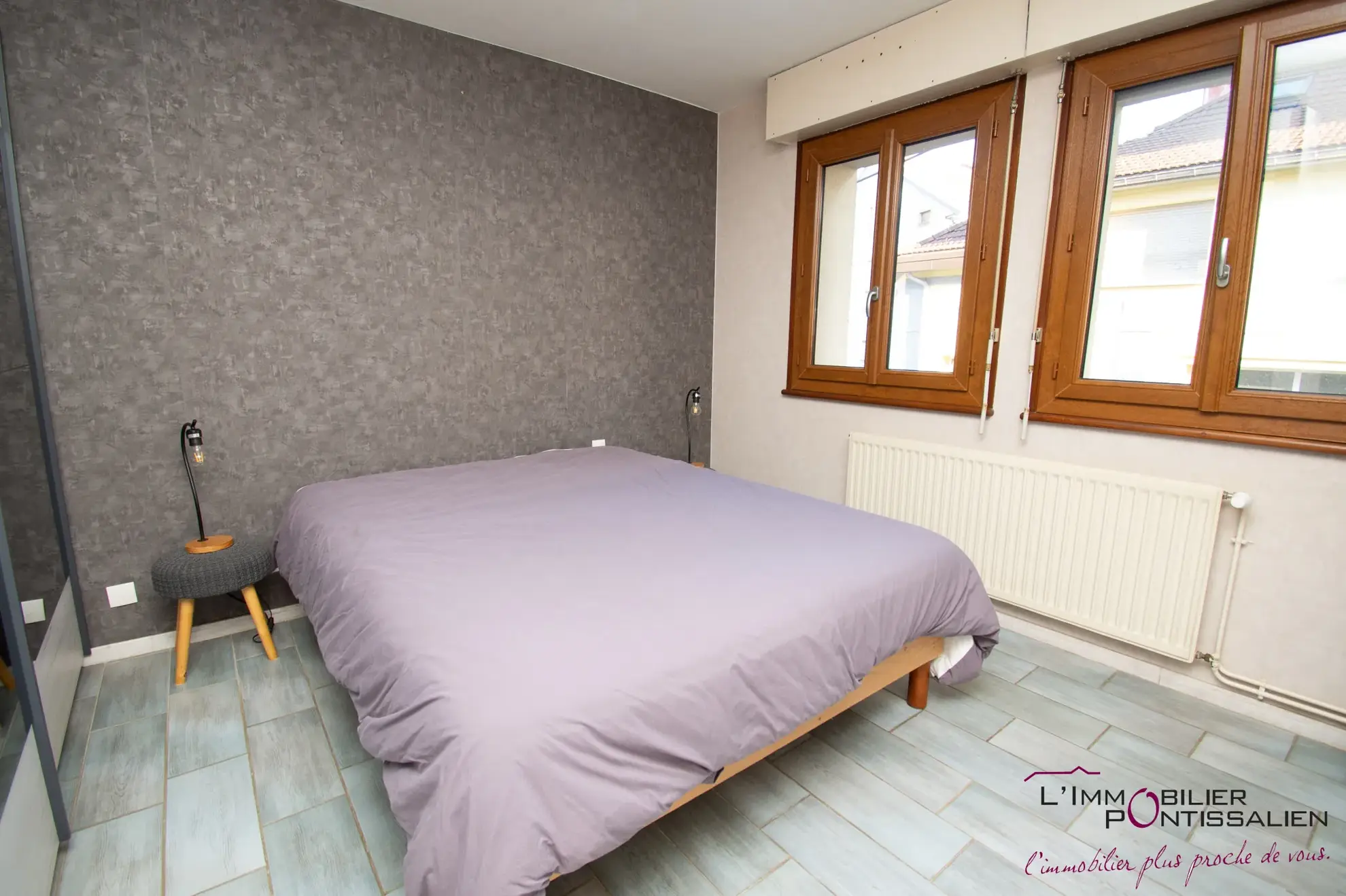 Maison mitoyenne de 127 m² avec terrasse, garage et 5 chambres au centre de Pontarlier 