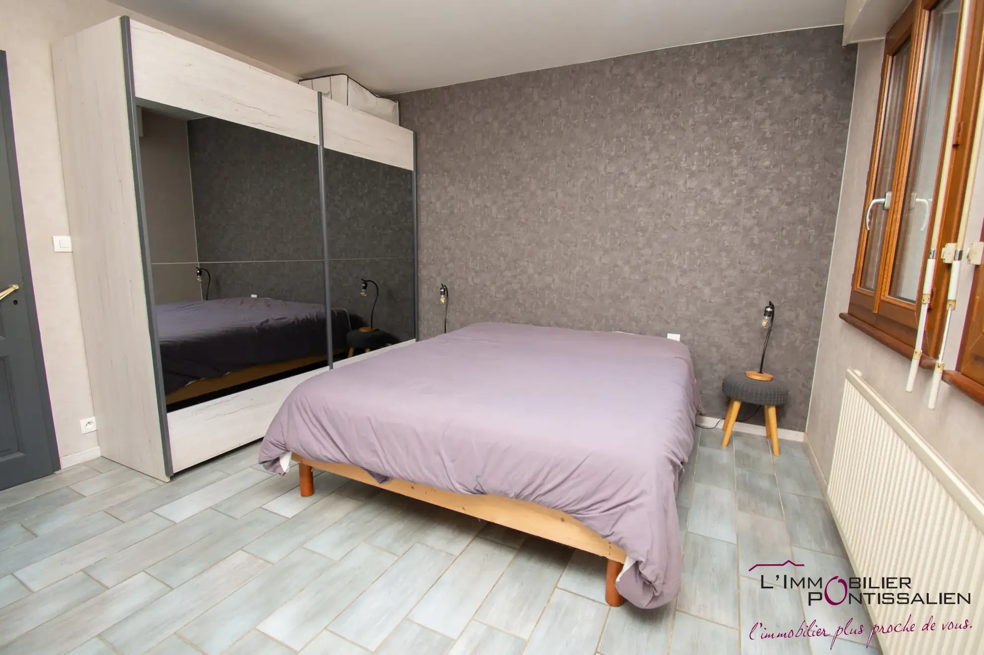 Maison mitoyenne de 127 m² avec terrasse, garage et 5 chambres au centre de Pontarlier 