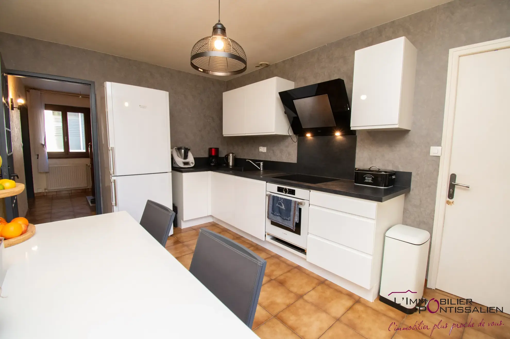 Maison mitoyenne de 127 m² avec terrasse, garage et 5 chambres au centre de Pontarlier 