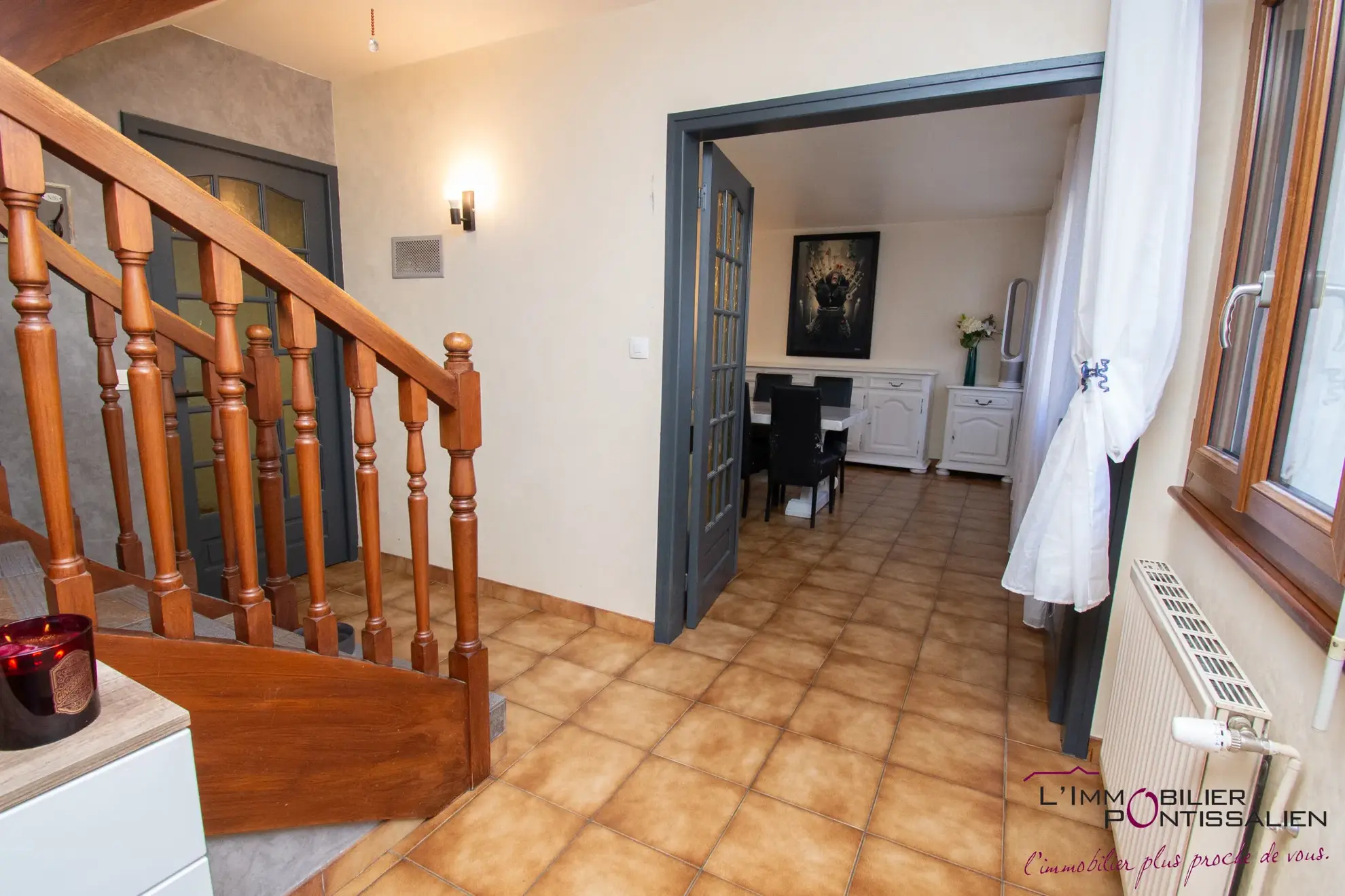 Maison mitoyenne de 127 m² avec terrasse, garage et 5 chambres au centre de Pontarlier 