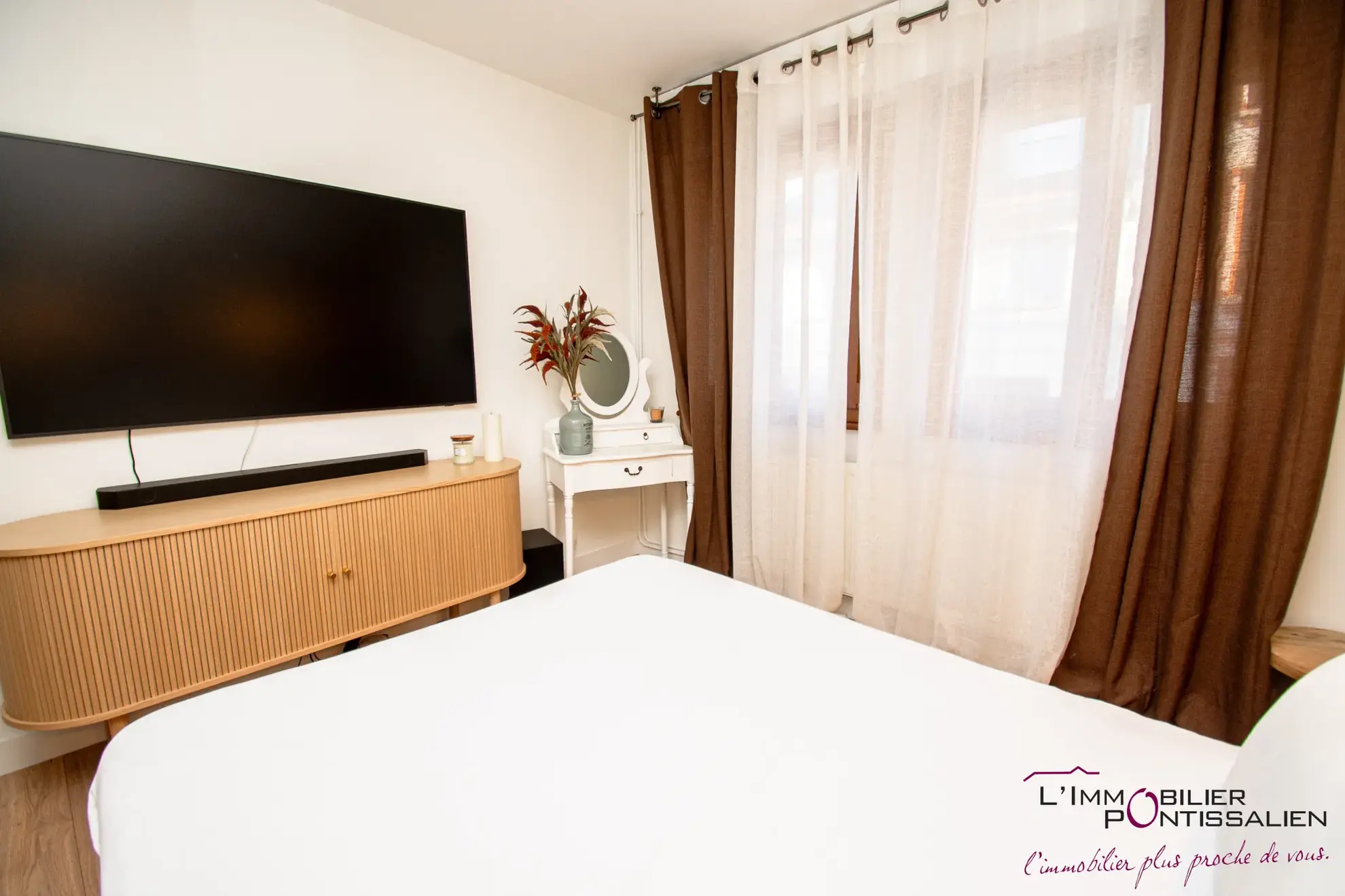 Maison mitoyenne de 127 m² avec terrasse, garage et 5 chambres au centre de Pontarlier 