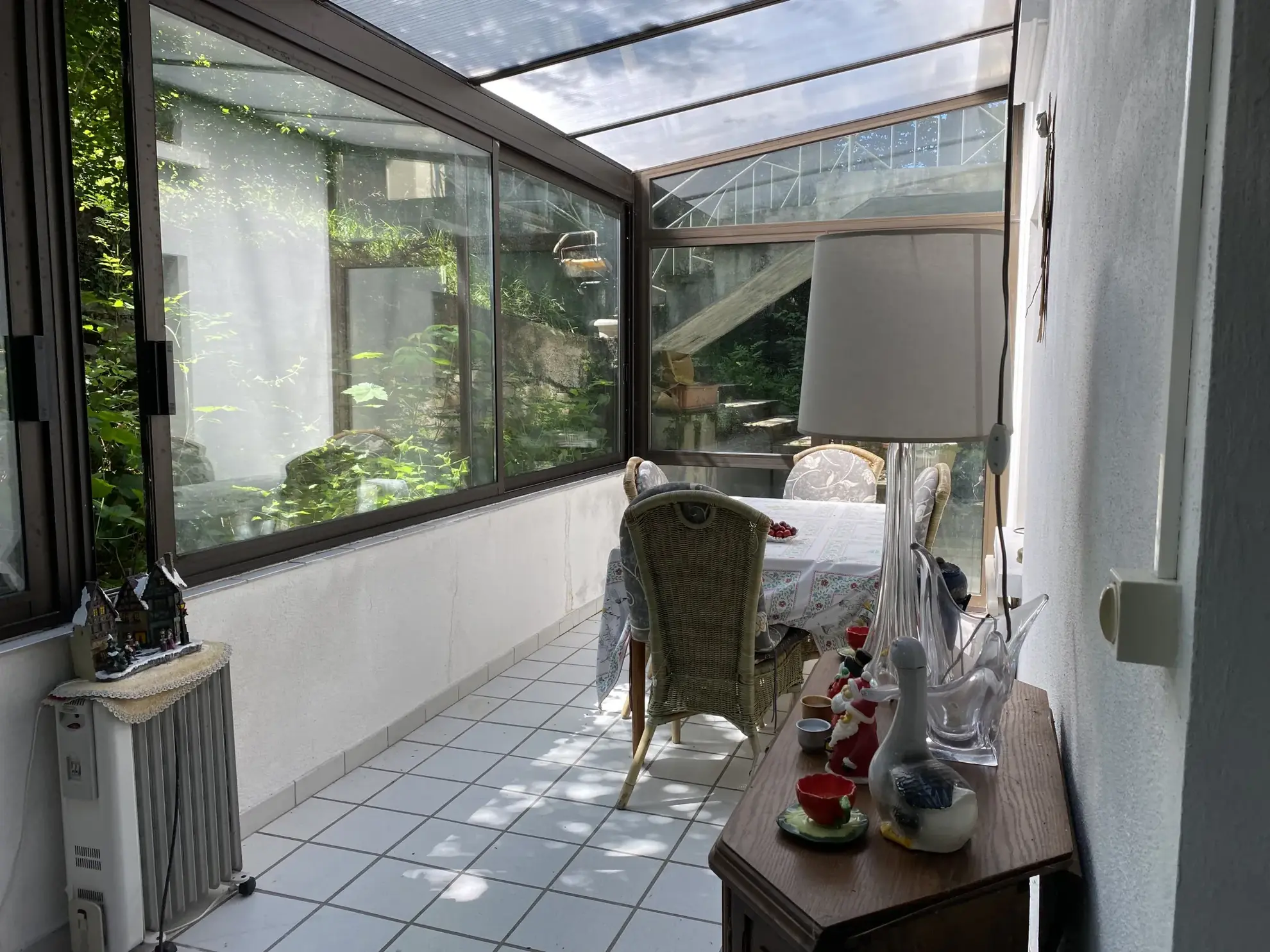 Maison lumineuse avec jardin, véranda et garage à Vieux-Charmont-Nommay