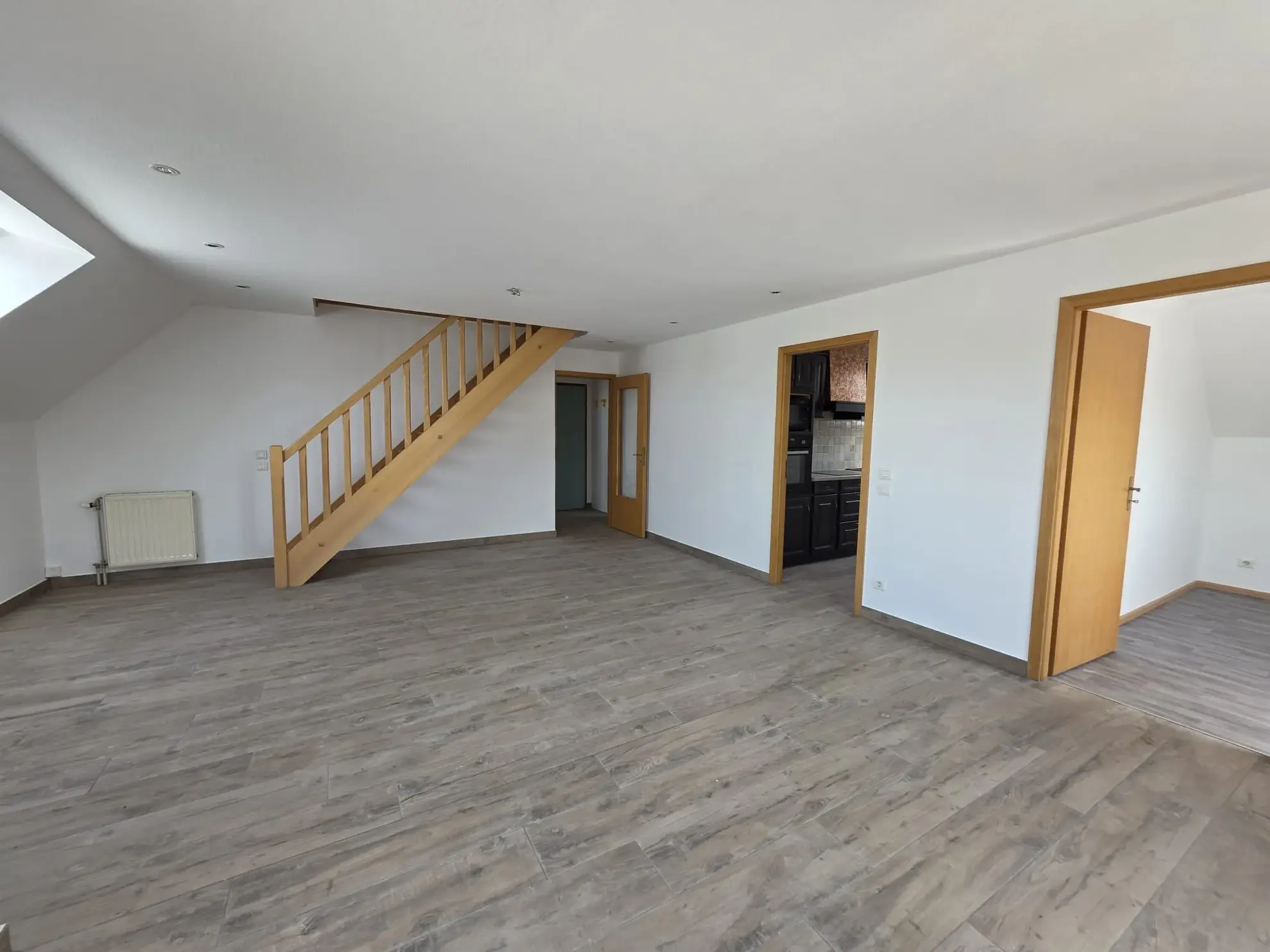 À vendre : Duplex lumineux de 95m² à Hirsingue avec garage, potentiel à exploiter 