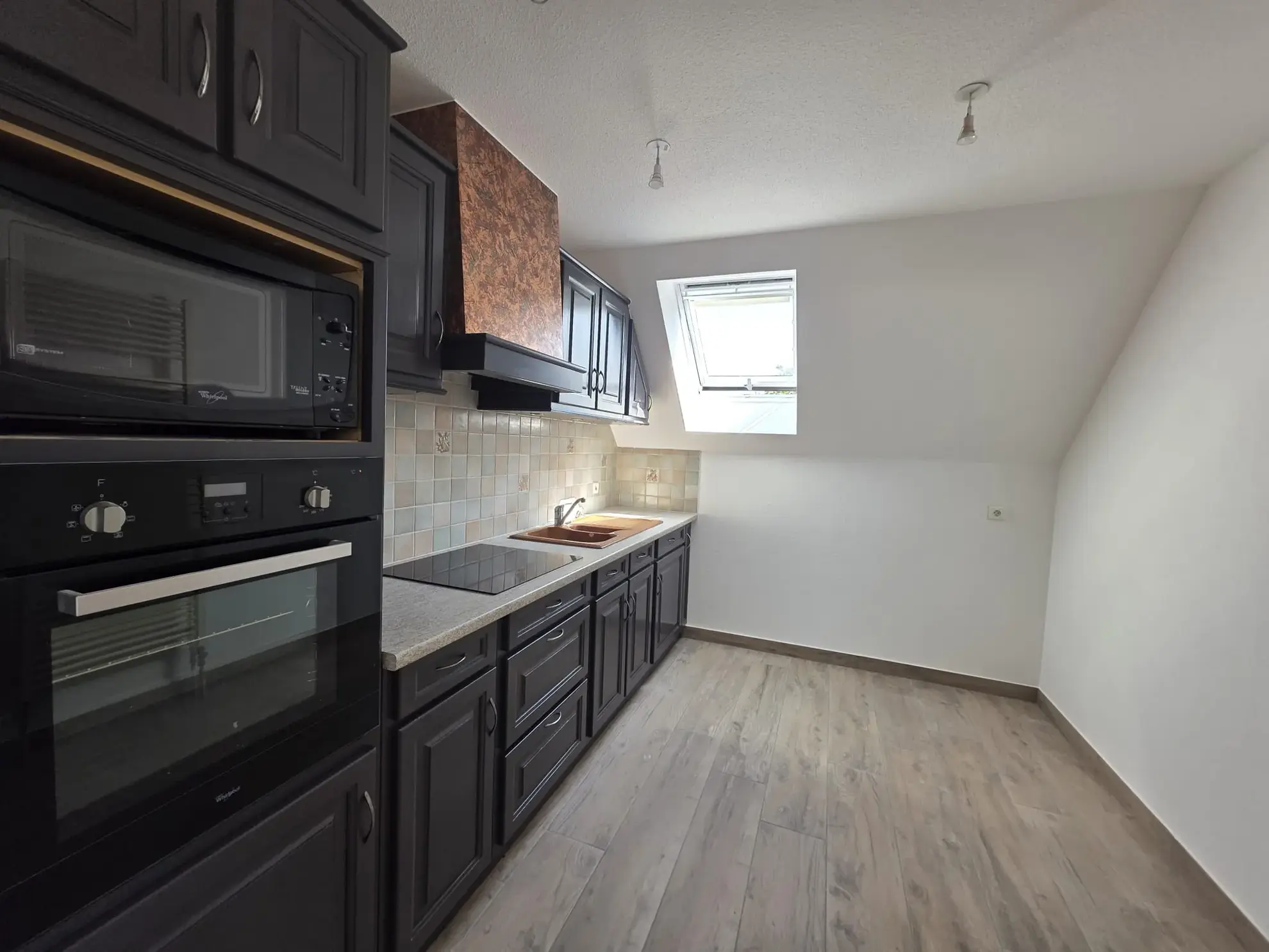 À vendre : Duplex lumineux de 95m² à Hirsingue avec garage, potentiel à exploiter