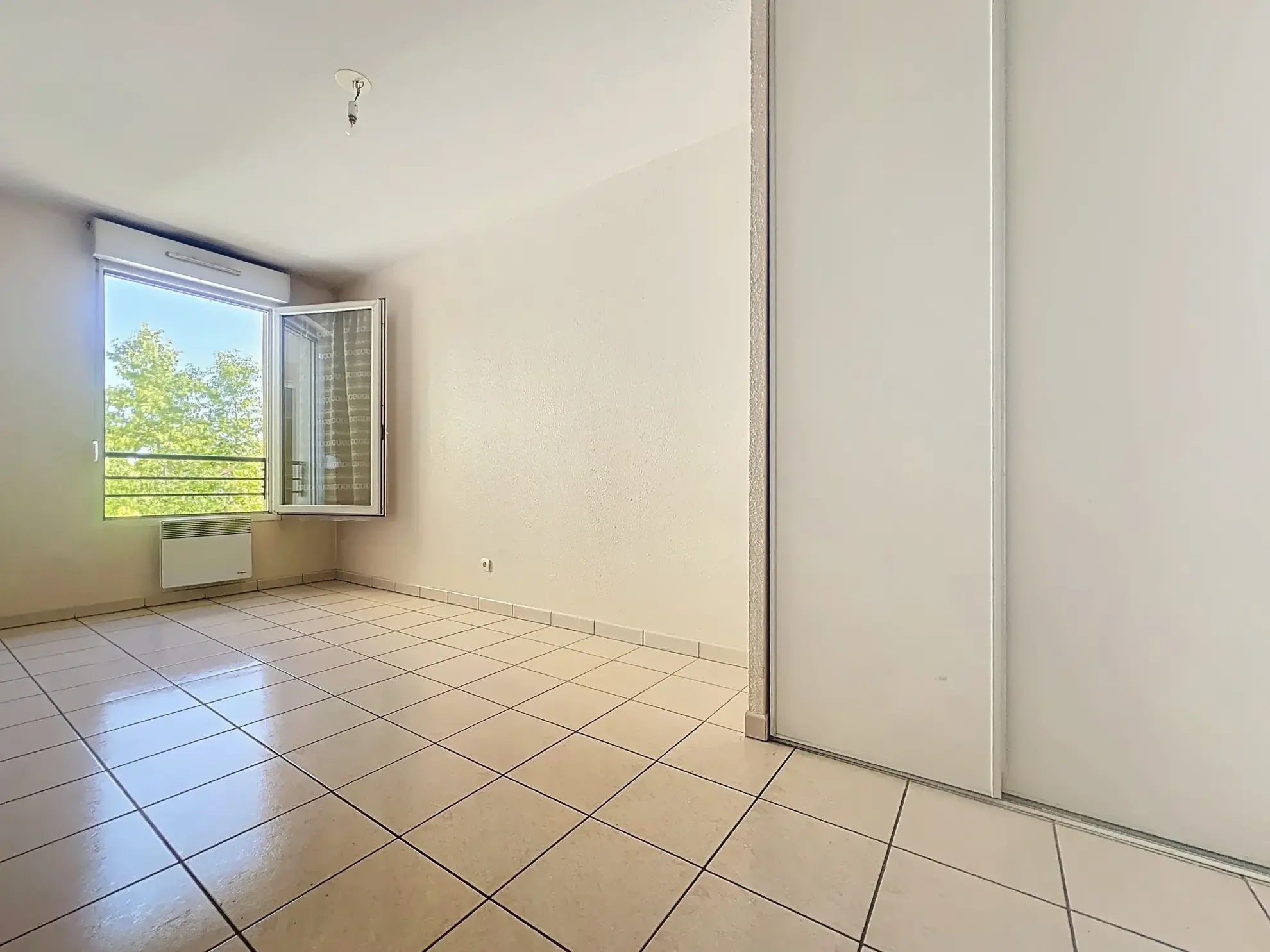 Appartement T3 avec balcon et garage à Pierre-Bénite, 66 m², secteur calme 
