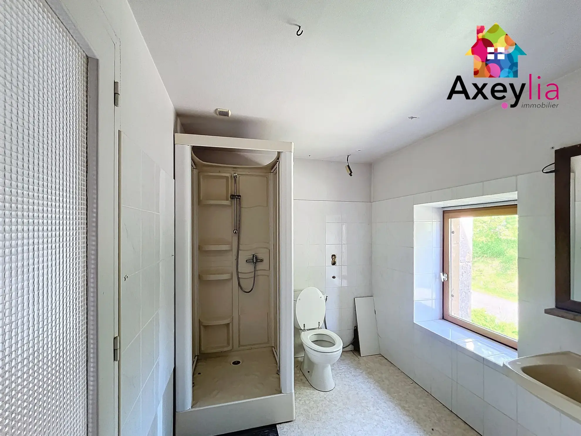 Immeuble à rénover de 250 m² à Chauffailles avec terrain et grange 