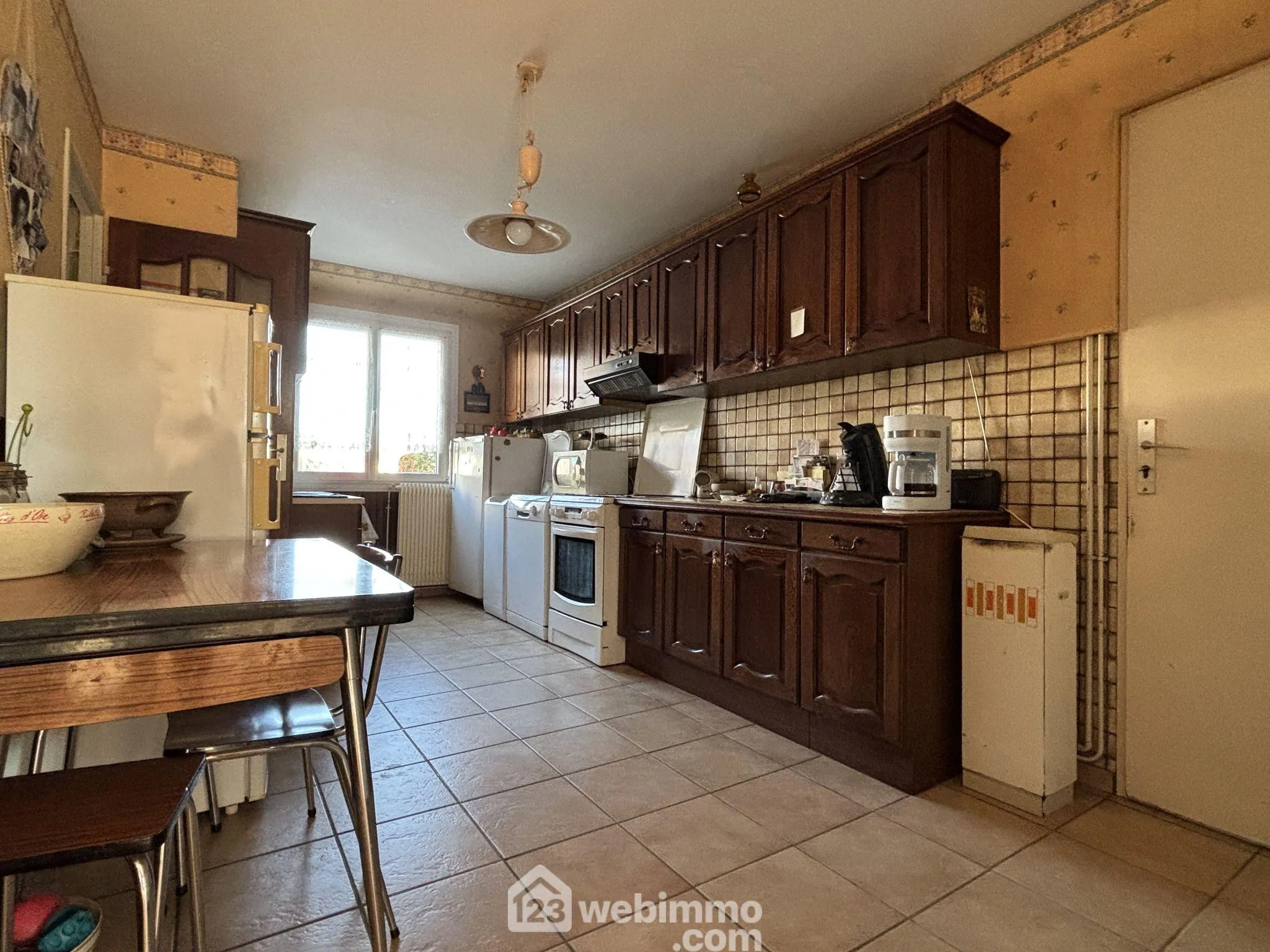 Achat maison 103m² à Naintré avec garage et terrain clos 