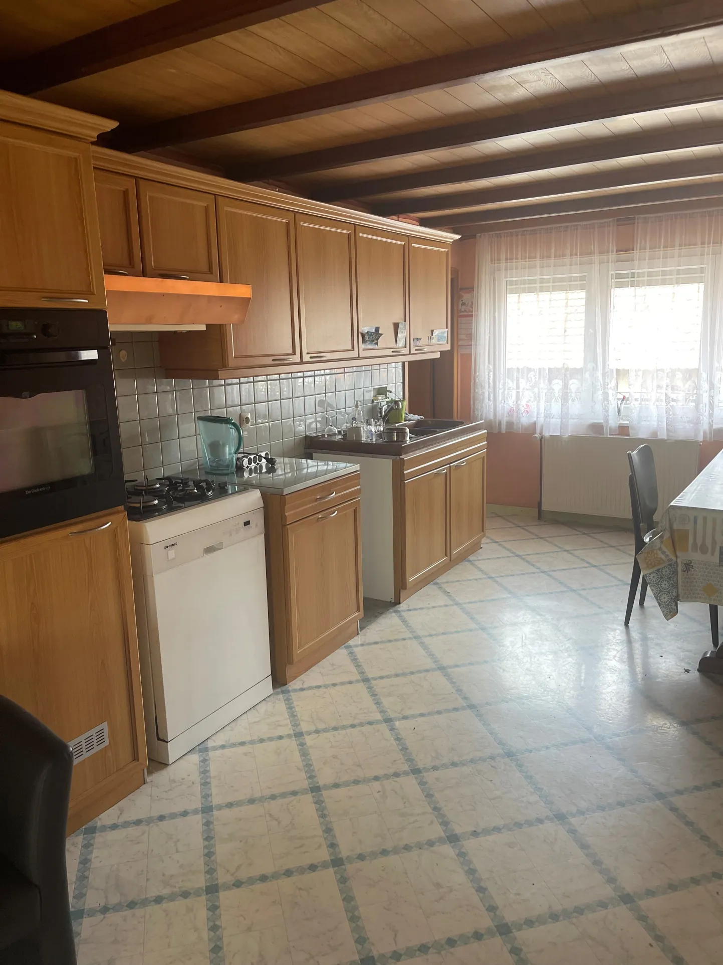 Maison à Manspach de 151 m2 avec potentiel de rénovation et terrasse couverte 