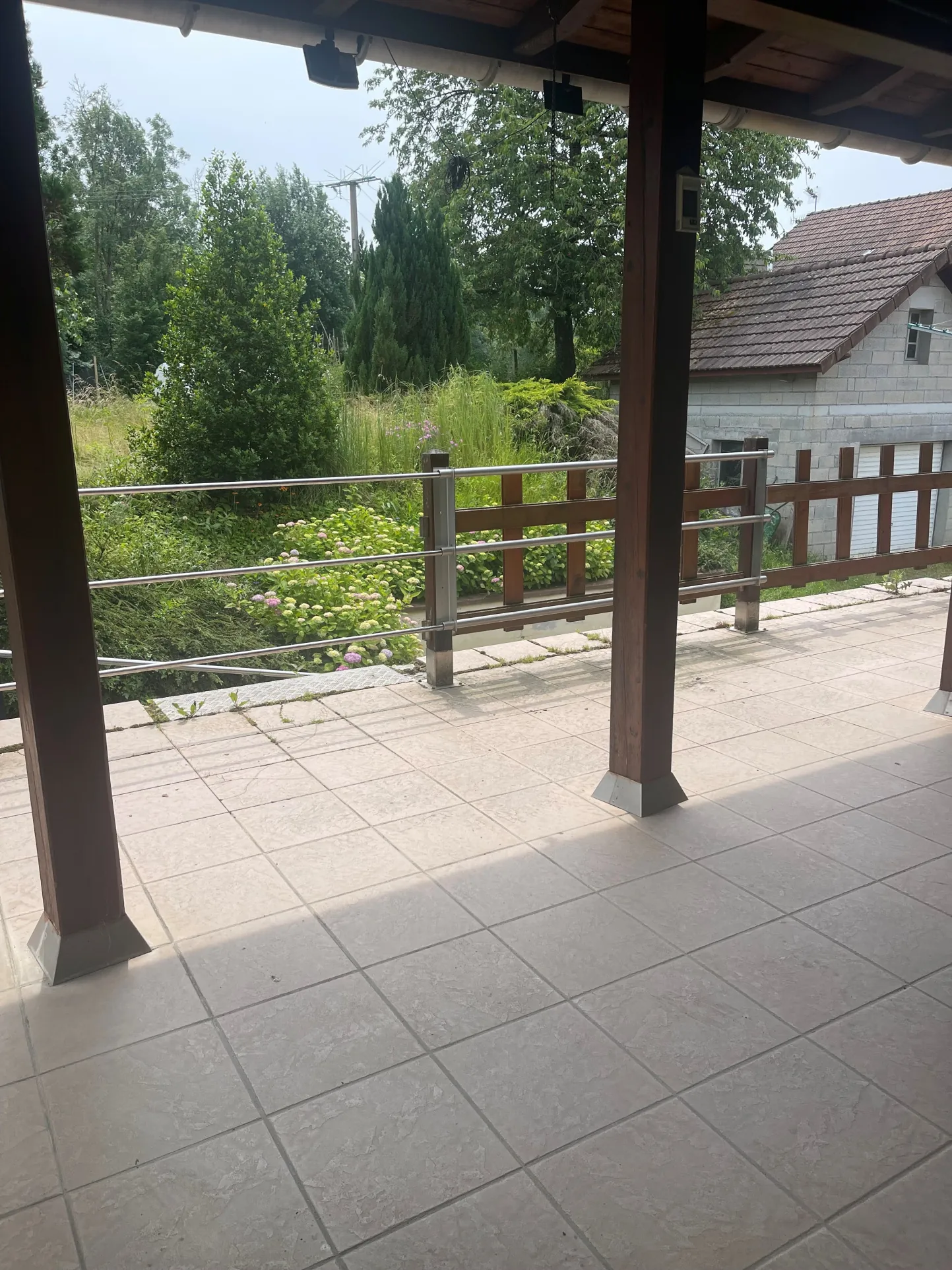 Maison à Manspach de 151 m2 avec potentiel de rénovation et terrasse couverte 