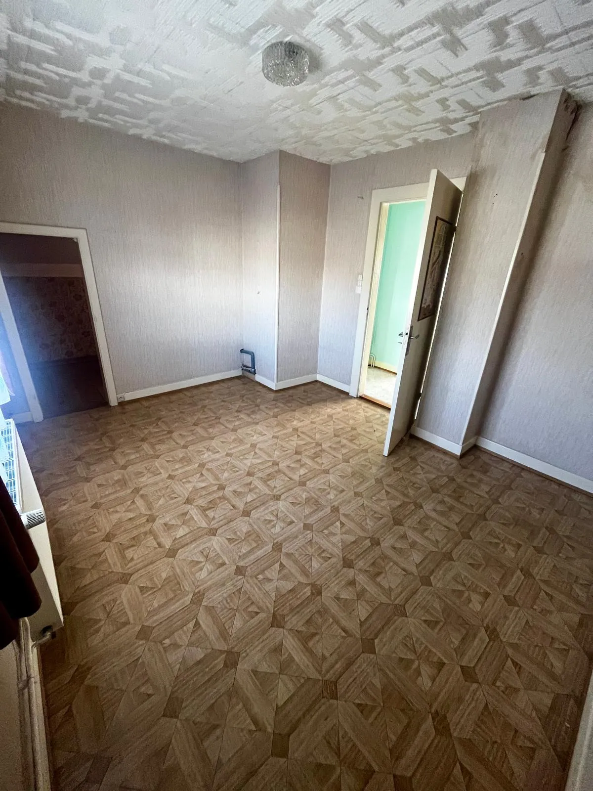 Maison d'environ 100m² à Bartenheim-La-Chaussée avec garage et terrain divisible 