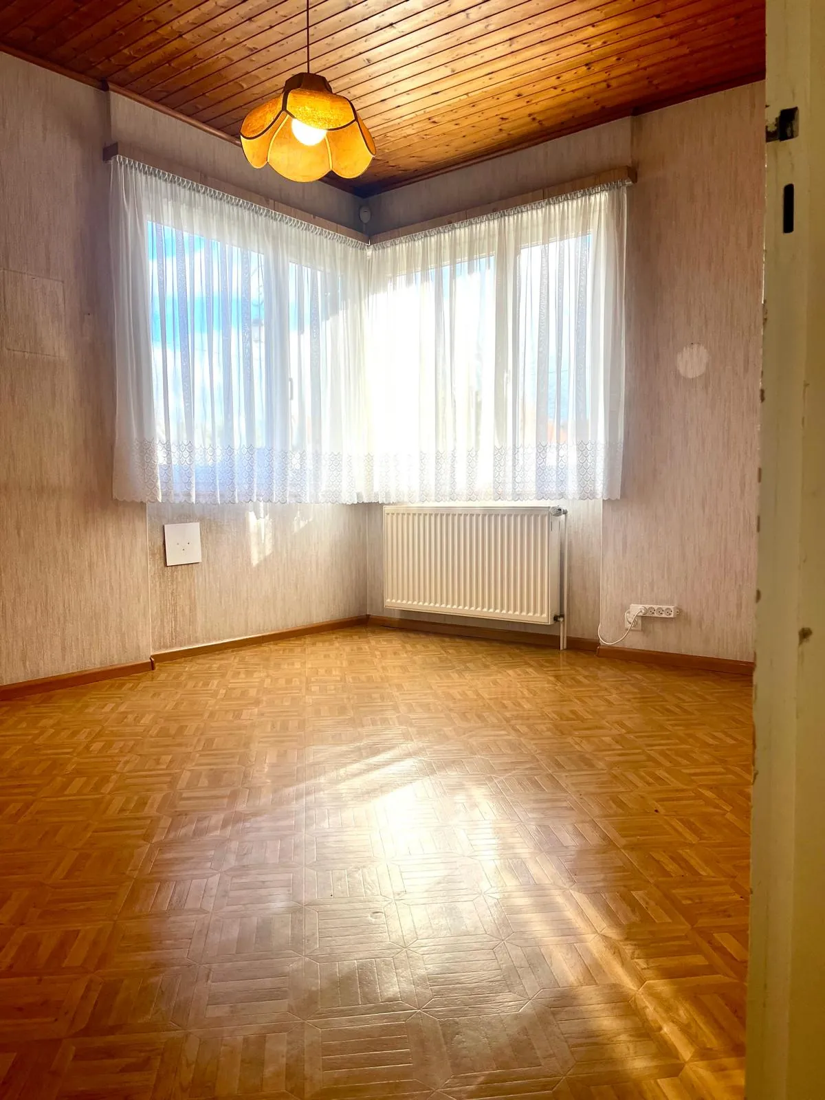 Maison d'environ 100m² à Bartenheim-La-Chaussée avec garage et terrain divisible 