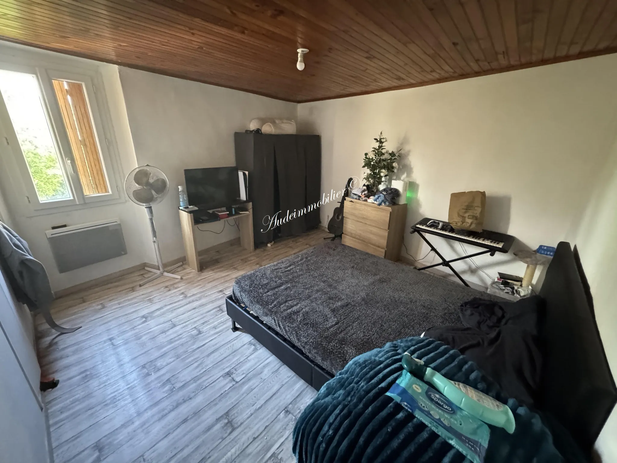 Immeuble de rapport à Limoux avec deux appartements loués et jardin 