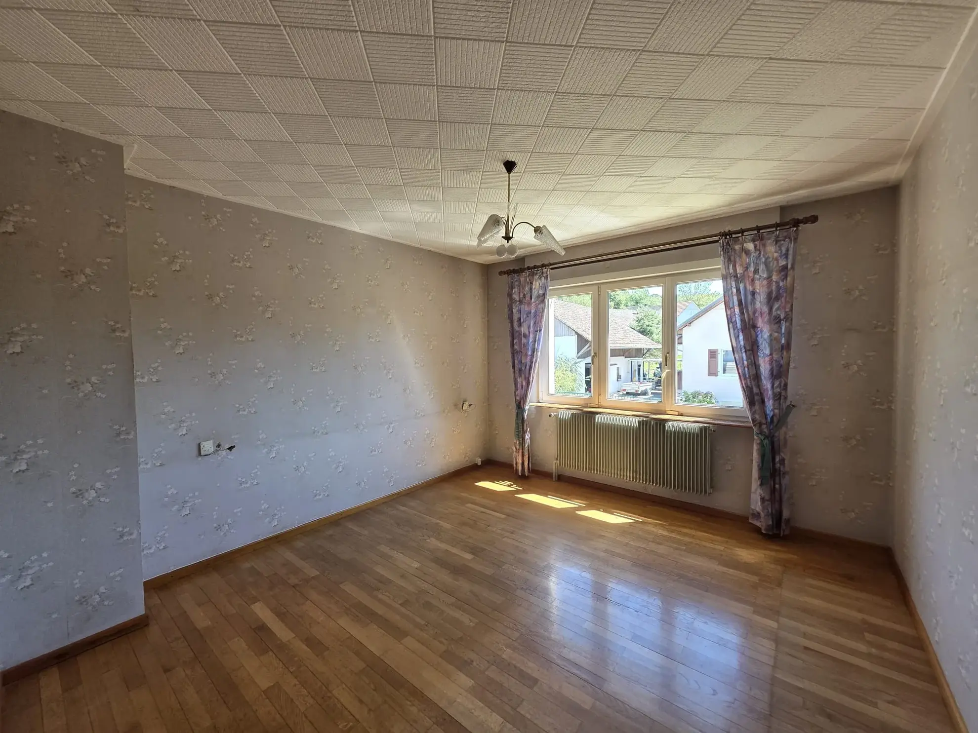 À vendre : Charmante maison de 112 m² à Aspach, espace lumineux et jardin verdoyant 
