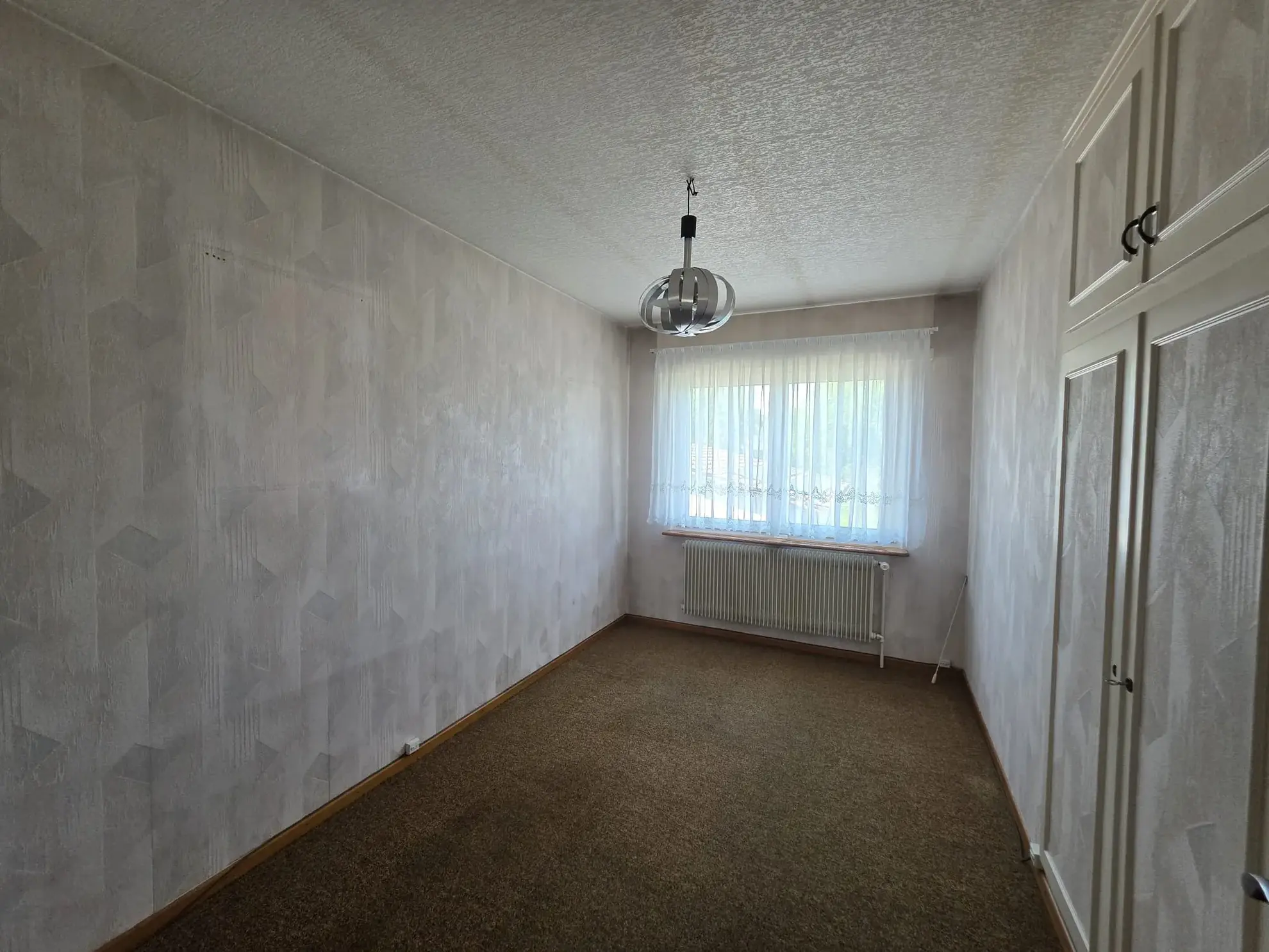 À vendre : Charmante maison de 112 m² à Aspach, espace lumineux et jardin verdoyant 